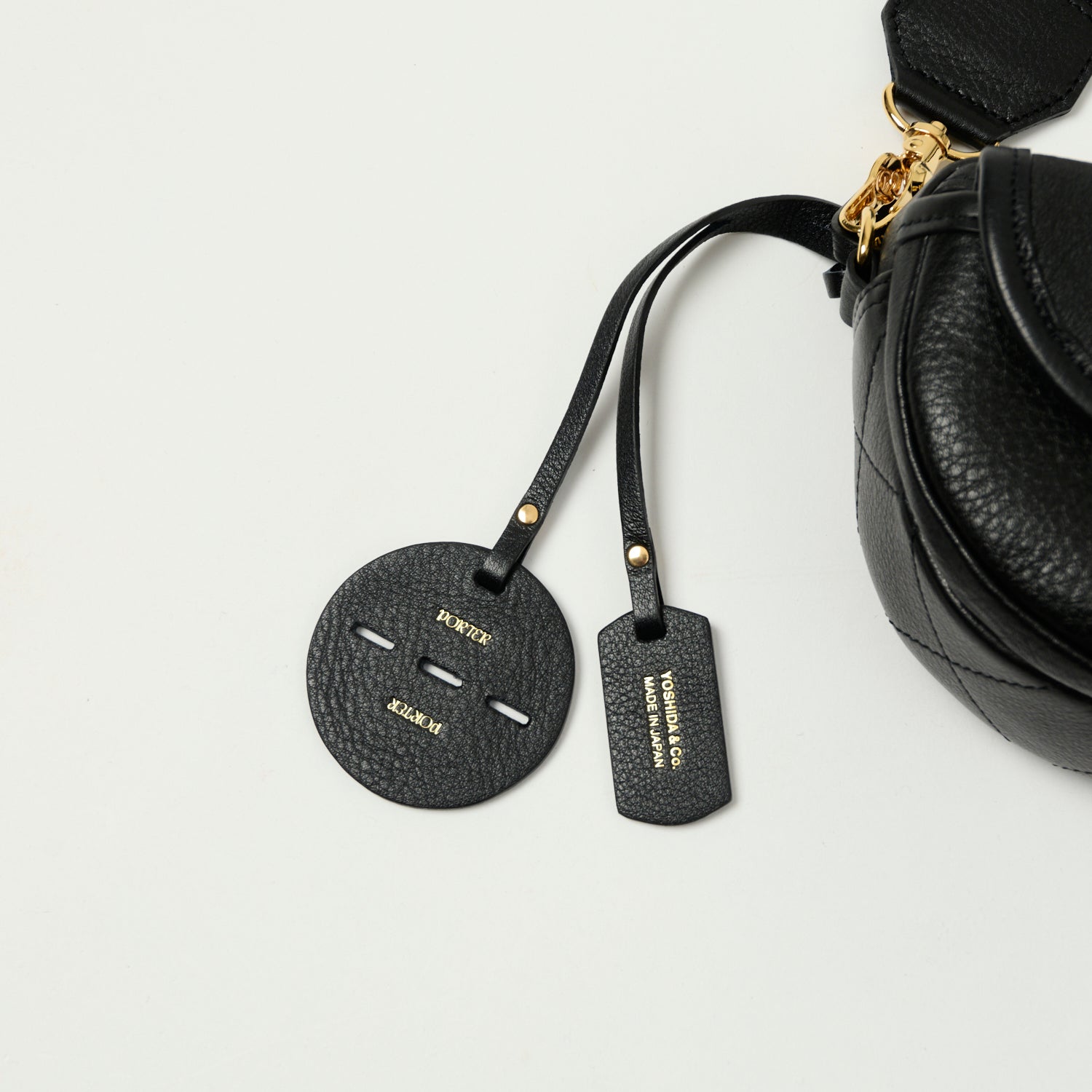 Porter Yoshida & Co. Mini Leather Crossbody Bag for Women - Stylish Black Shoulder Purse - Perfect for Everyday Use, Travel & Date Night