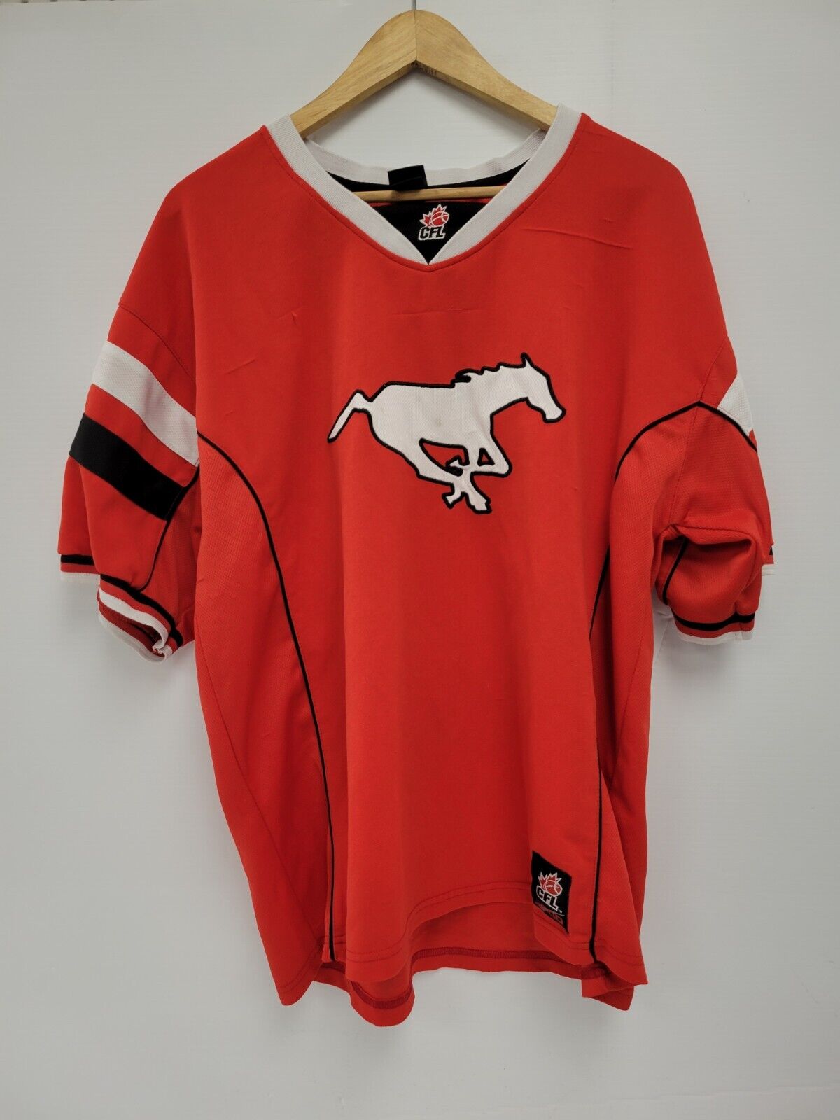 Official Calgary Stampeders CFL Football Jersey - Size Large for Men - Perfect for Game Day, Tailgating & Fan Events