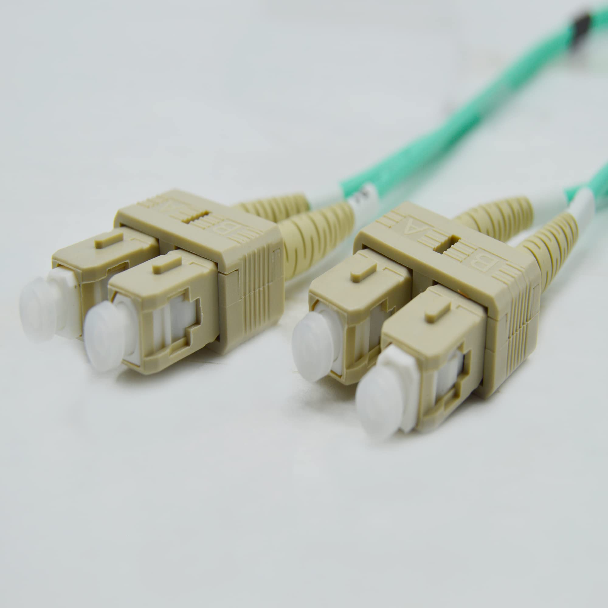 OM4 SC-SC Fiber Optic Cable 100M (328ft) - 100Gb Duplex 50/125 Multimode Jumper for 10G/40G/100G Networks | High-Speed Data Center, Server Room & Telecom Applications | Length Options 0.5M-300M | OFNR Rated Aqua Cable