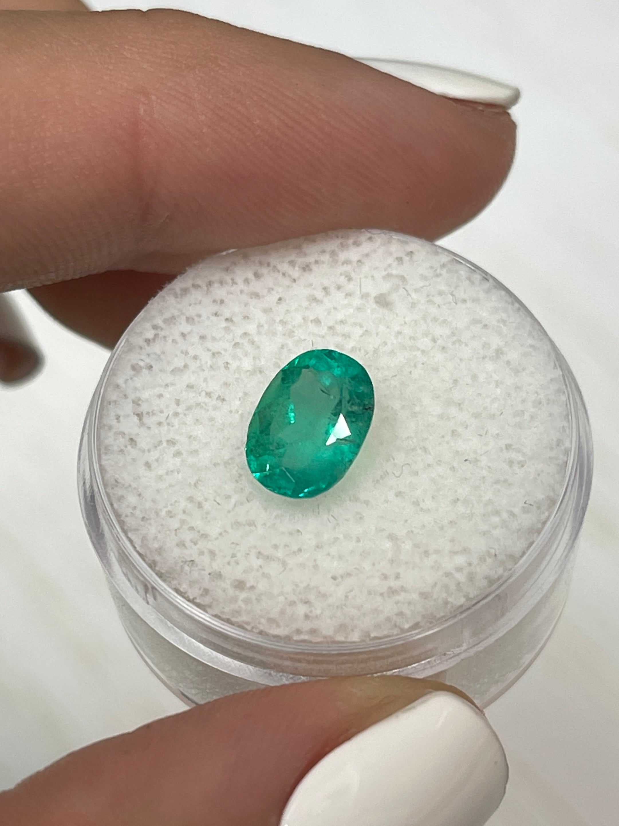 1.74 Carat 9x7mm Natural Colombian Emerald Oval Cut Loose Gemstone - Bluish Green with Freckles for Jewelry Making & Engagement Rings
