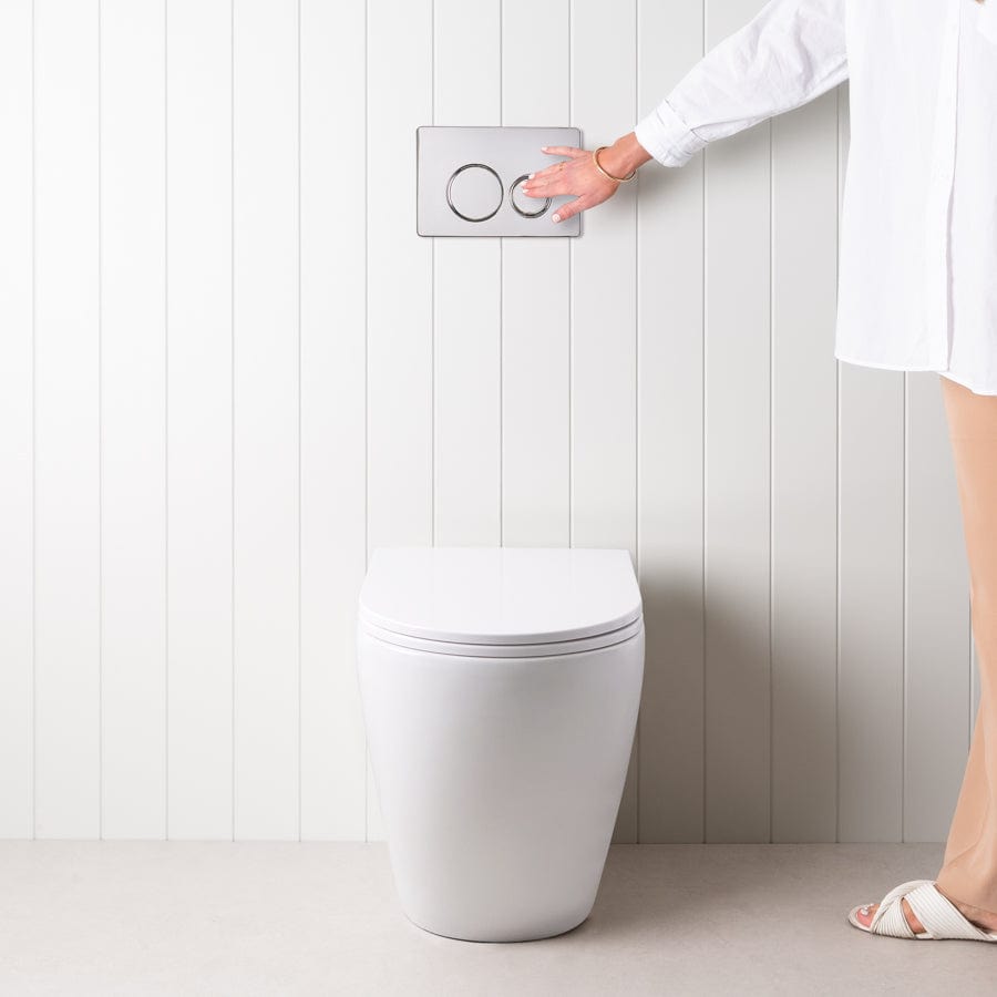 Wall-Mounted Curved Toilet with Round Chrome Flush Buttons - Space-Saving Modern Bathroom Solution for Small Spaces & Contemporary Homes