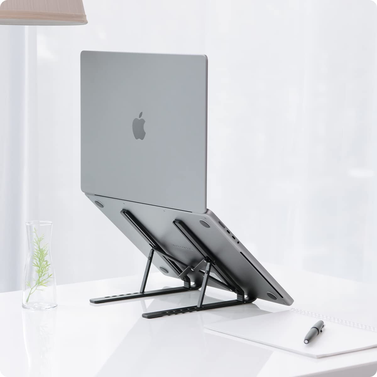 Spigen Adjustable Laptop Stand for Desk - Portable & Foldable Computer Stand Holder for MacBook, Dell, HP, Lenovo (Black, LD201) | Perfect for Home Office, Bed, Couch & Travel Use