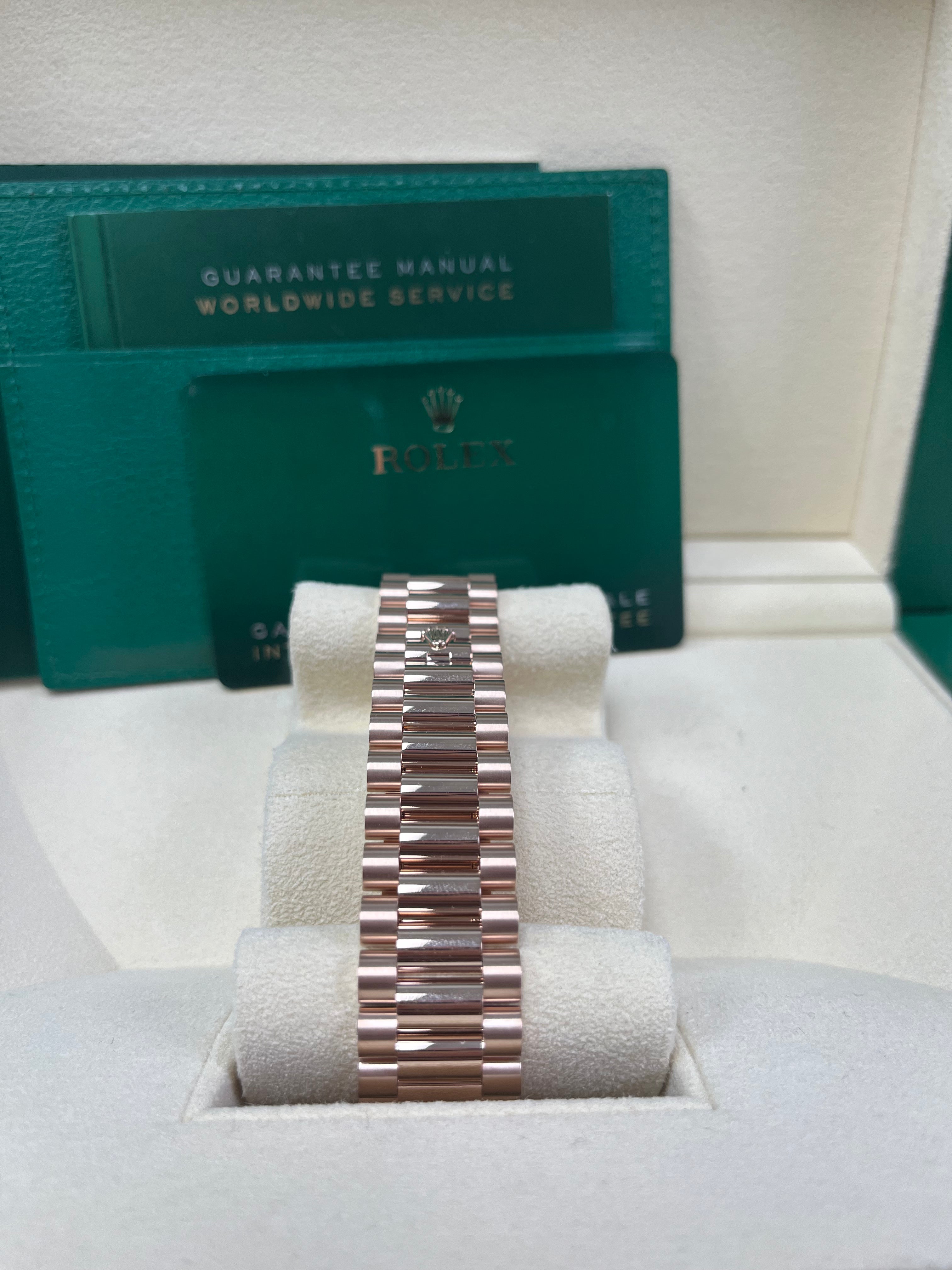 Rolex Day-Date 40 Rose Gold Men's Watch with Fluted Bezel & Chocolate Baguette Diamond Dial - Model 228235 | Luxury Dress Watch for Business & Formal Occasions