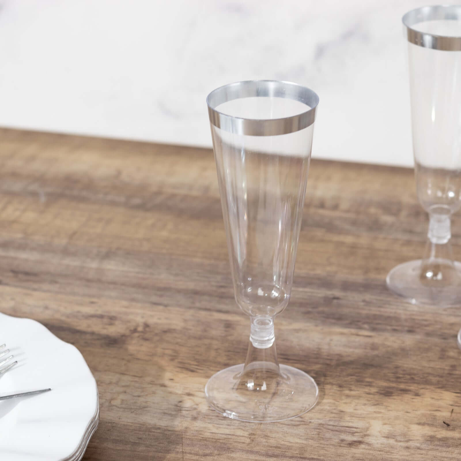 12 Pack Clear Plastic Champagne Flutes with Silver Rim - 5oz Disposable Cocktail Glasses for Weddings, Parties & Celebrations - Elegant & Stylish Drinkware for Toasts, Brunches & Special Events