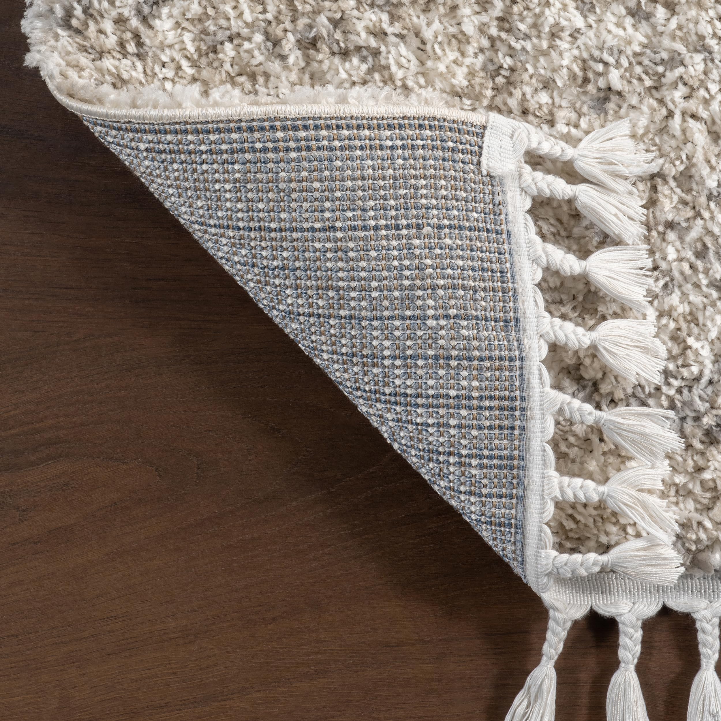 nuLOOM Brooke Shag Tasseled Area Rug - Soft Plush 7x9 Oval Ivory Rug for Living Room, Bedroom, Dining Room & Nursery | Cozy Home Decor, Perfect for Family Gatherings & Relaxation