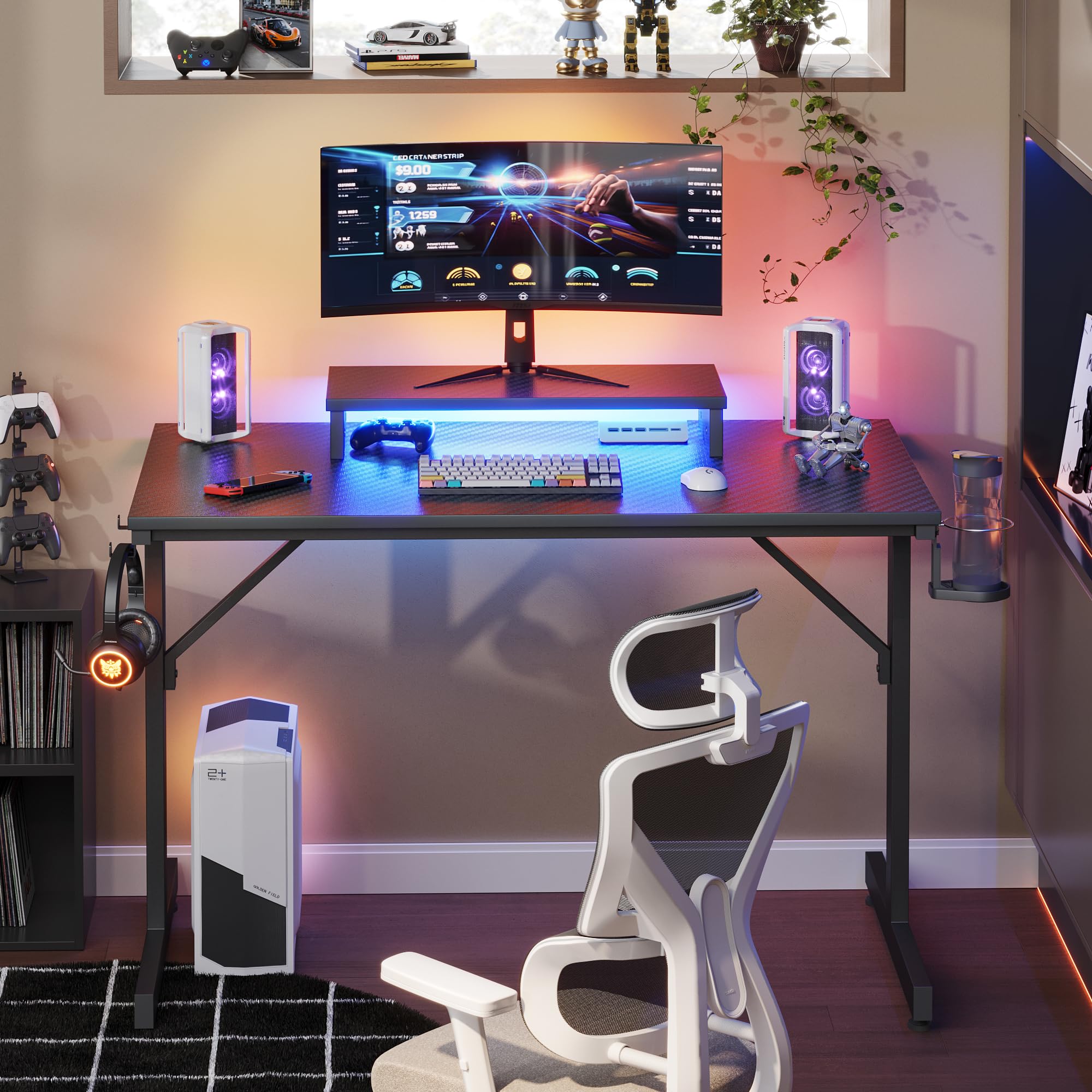 Bestier 42 Inch Gaming Desk with LED Lights - Small Computer Desk with Monitor Shelf & Headphone Hook - Black Carbon Fiber Texture Gaming Table for Kids & Teens - Perfect for PC Gaming, Streaming & Home Office Setup