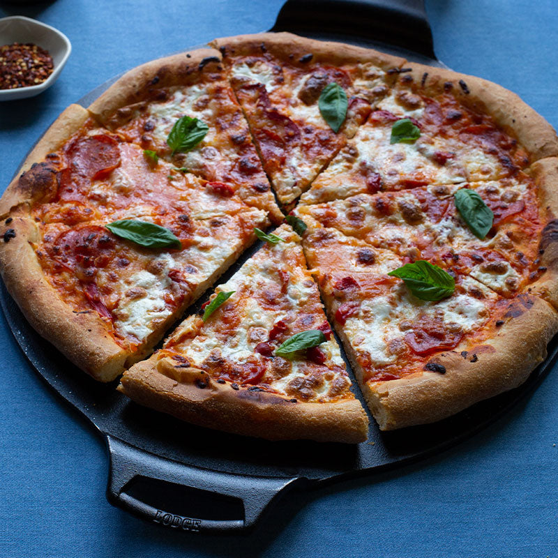 Lodge 15 Inch Cast Iron Pizza Pan - Pre-Seasoned, Heavy Duty Baking Stone for Homemade Pizza, Bread & Desserts - Perfect for Oven, Grill & Outdoor Cooking