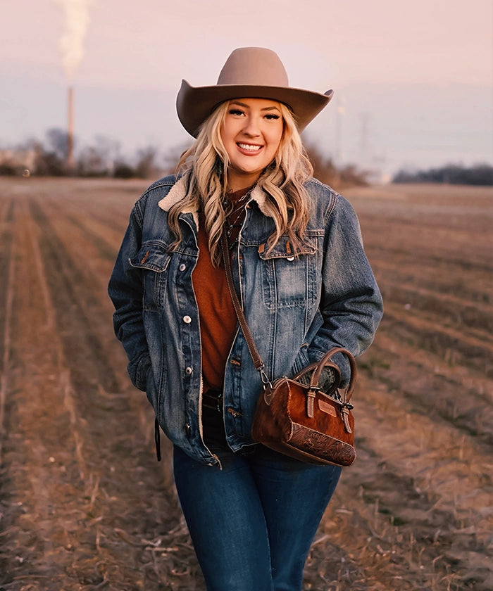 Wrangler Genuine Hair-On Cowhide Barrel Bag - Western Style Leather Crossbody Purse for Women | Perfect for Rodeo, Country Music Festivals & Everyday Use