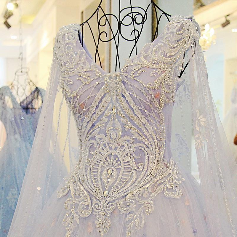 Elegant A-Line V-Neck Lace Crystal Beaded Wedding Dress in White & Light Blue - Floor Length Gown for Bridal, Formal Events & Special Occasions