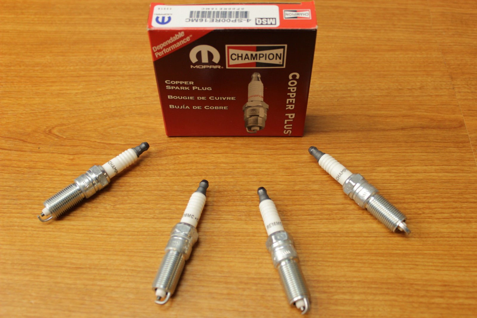 Chrysler Dodge Caravan Jeep Wrangler Spark Plugs Set of 4 - OEM Replacement Parts for Smooth Engine Performance | Perfect for Off-Roading, Daily Commuting & Engine Maintenance