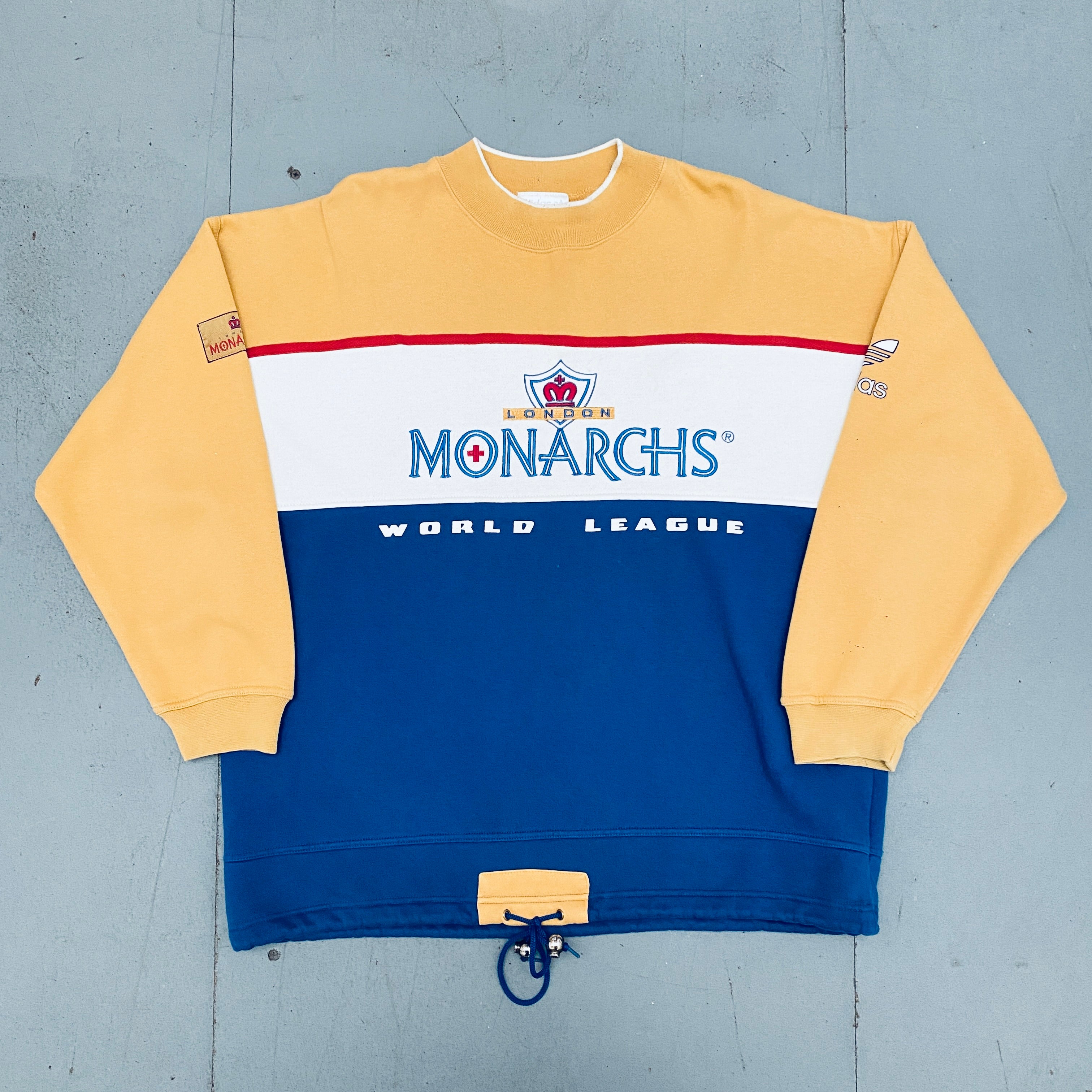 Vintage 1990s Adidas Embroidered Spellout Sweatshirt - WLAF London Monarchs Retro Football Apparel (L/XL) | Perfect for Sports Fans, Retro Fashion & Collectors