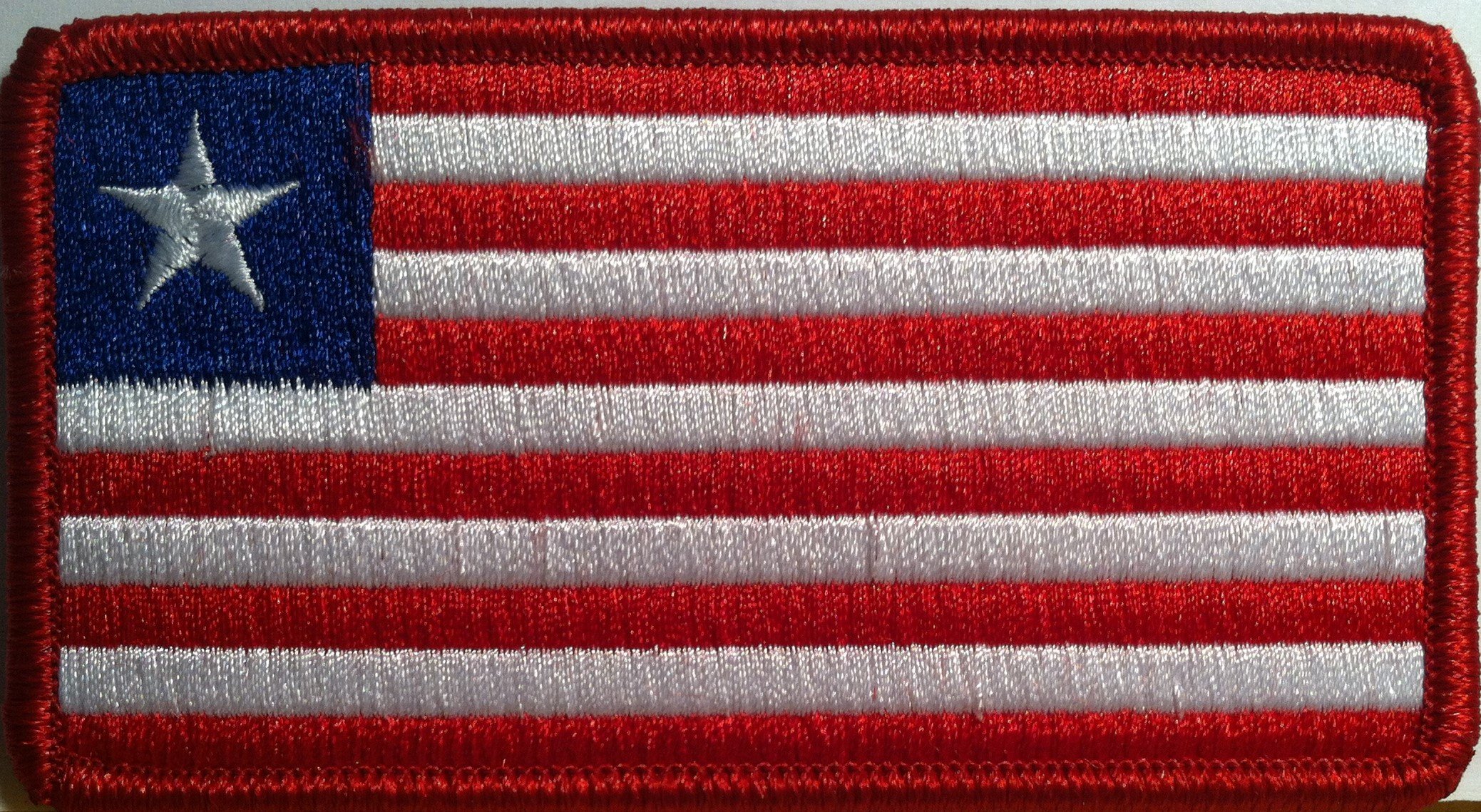 Liberia Flag Iron-on Patch with Red Border - Embroidered Emblem for DIY Crafts, Backpacks, Jackets & Hats | Patriotic Sew-on Badge for Clothing & Accessories
