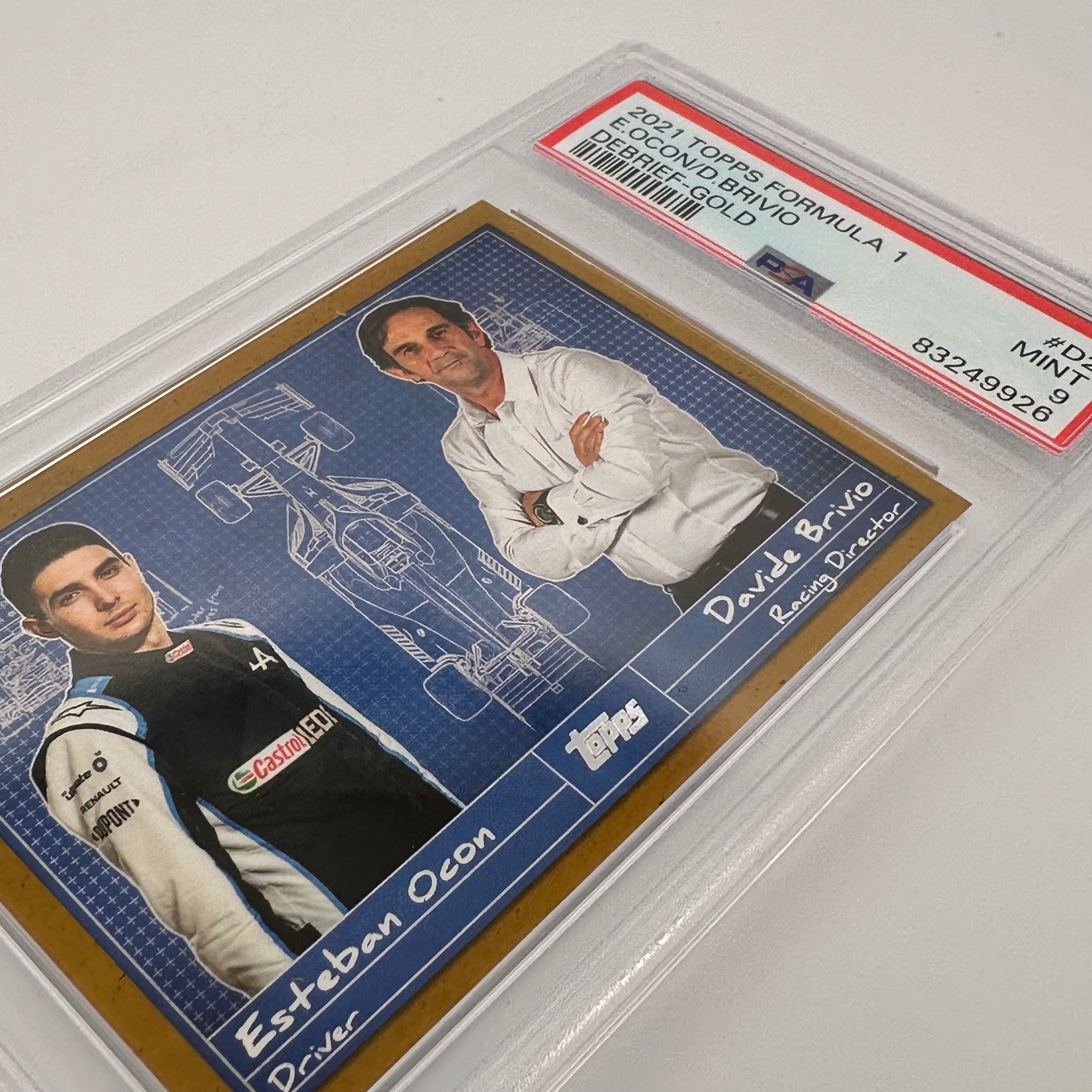 PSA 9 Graded 23/50 Esteban Ocon & Davide Brivio Debrief #D2 Gold Autograph Racing Card - Perfect for F1 Collectors and Motorsport Memorabilia Displays