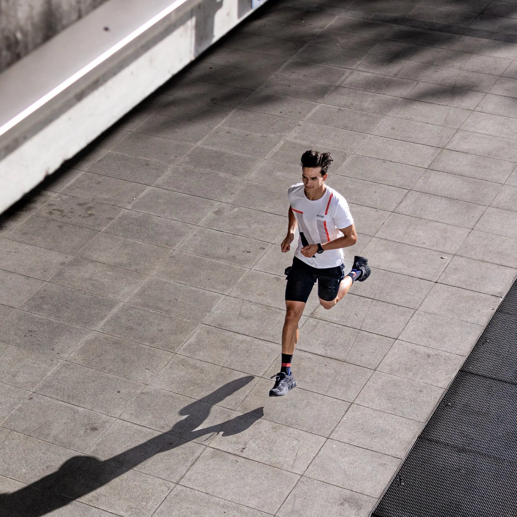 CEP Men's Performance Running Shirt - Moisture Wicking Round Neck Short Sleeve Athletic Top (White/Geometric Print) - Ideal for Jogging, Gym Workouts & Outdoor Sports