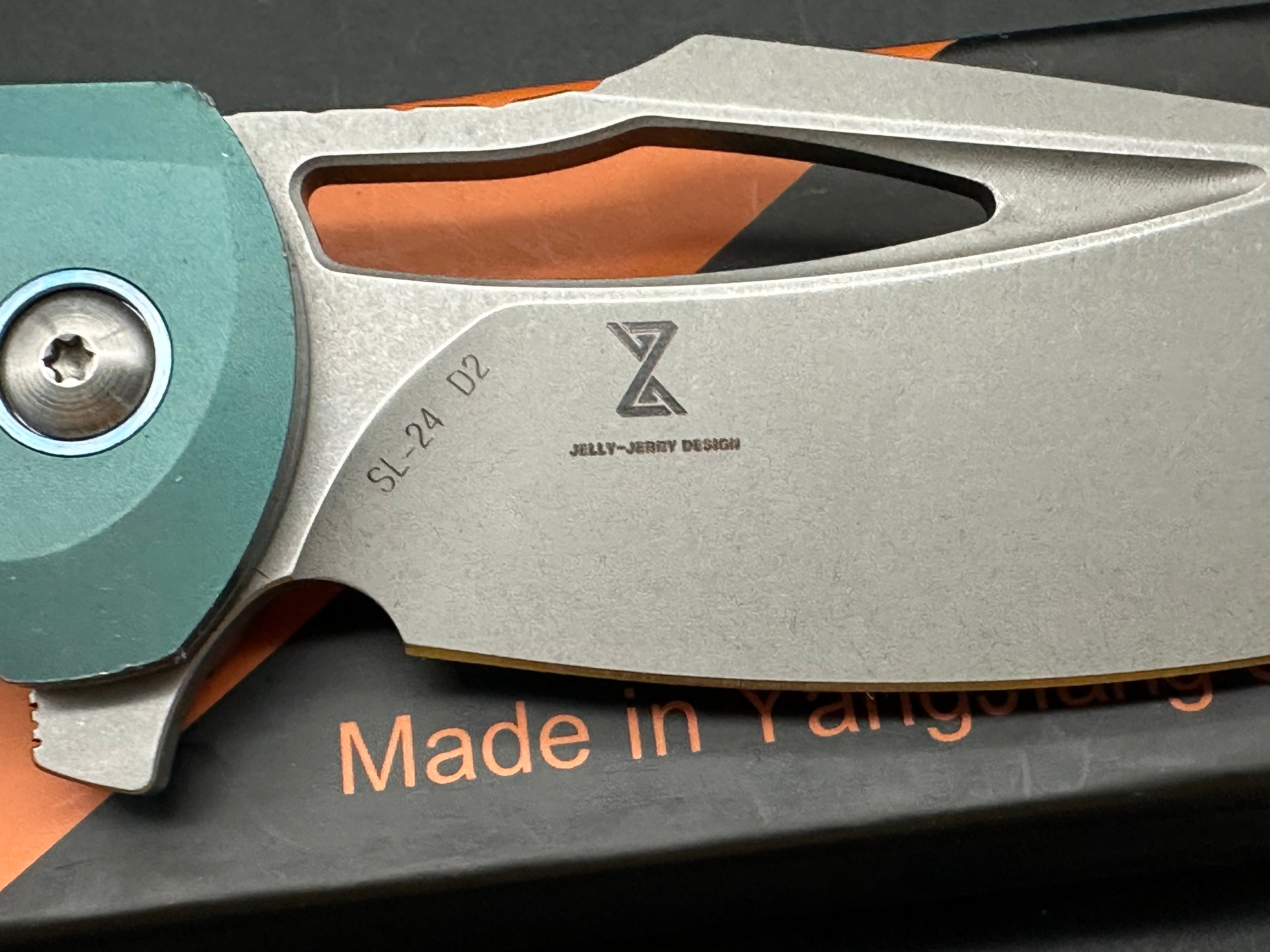 SIXLEAF SL 24 Jerry Jelly Pocket Knife - Plain Edge D2 Blade, Green Titanium Bolster & Carbon Fiber Handle - EDC, Camping, Hiking, Survival Gear