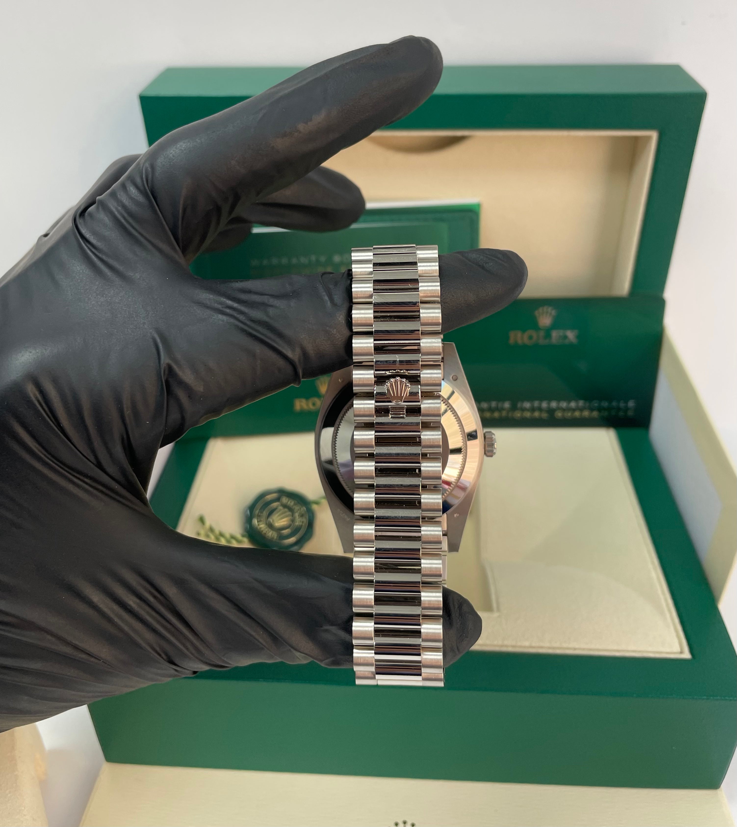 Rolex Day-Date 40mm 18K White Gold Watch with White Roman Dial, Fluted Bezel & President Bracelet (Ref. 228239) - Luxury Dress Watch for Business & Formal Occasions
