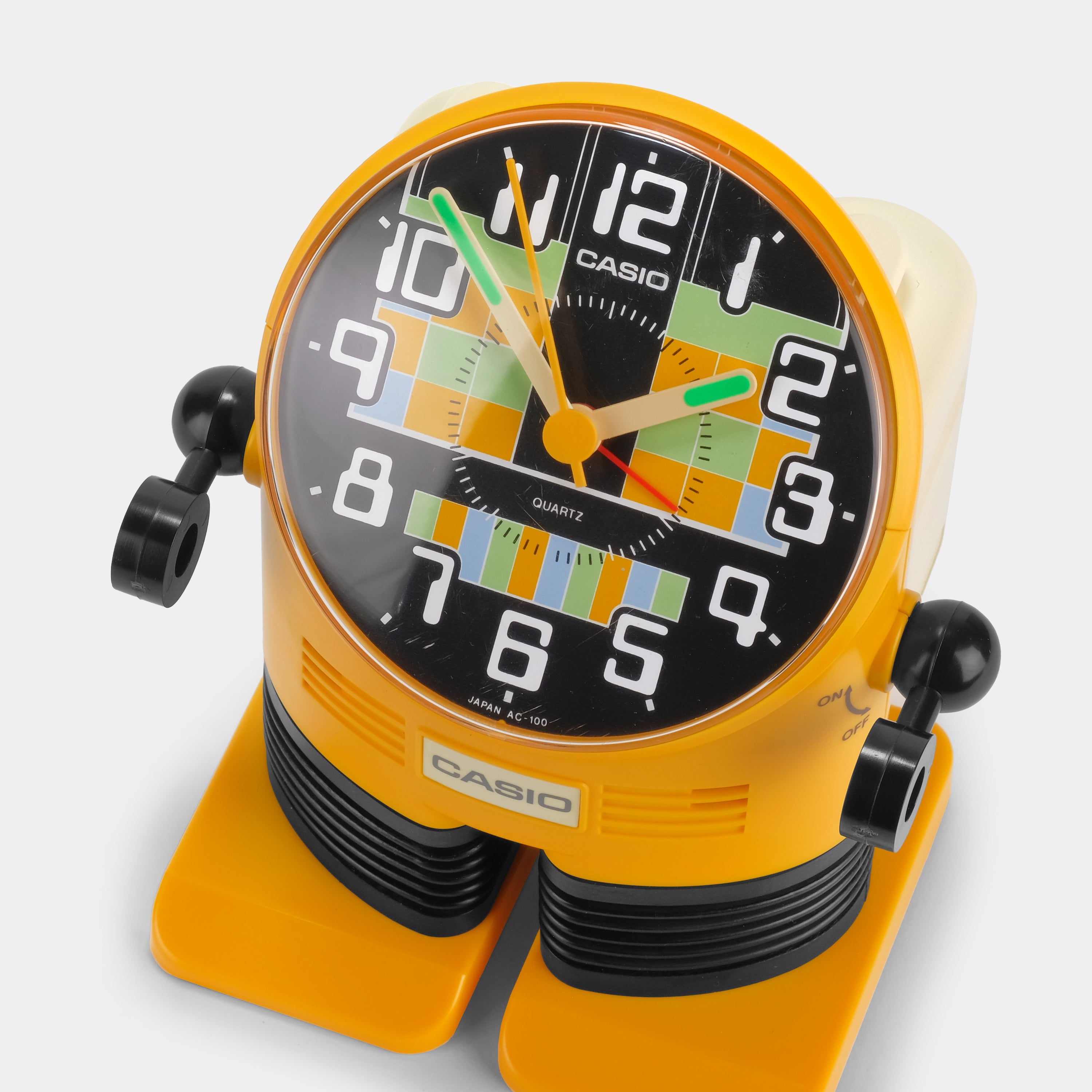 Casio AC-100 Yellow Digital Alarm Clock with Robot Design - Perfect for Kids' Bedrooms, Offices, and Collectors