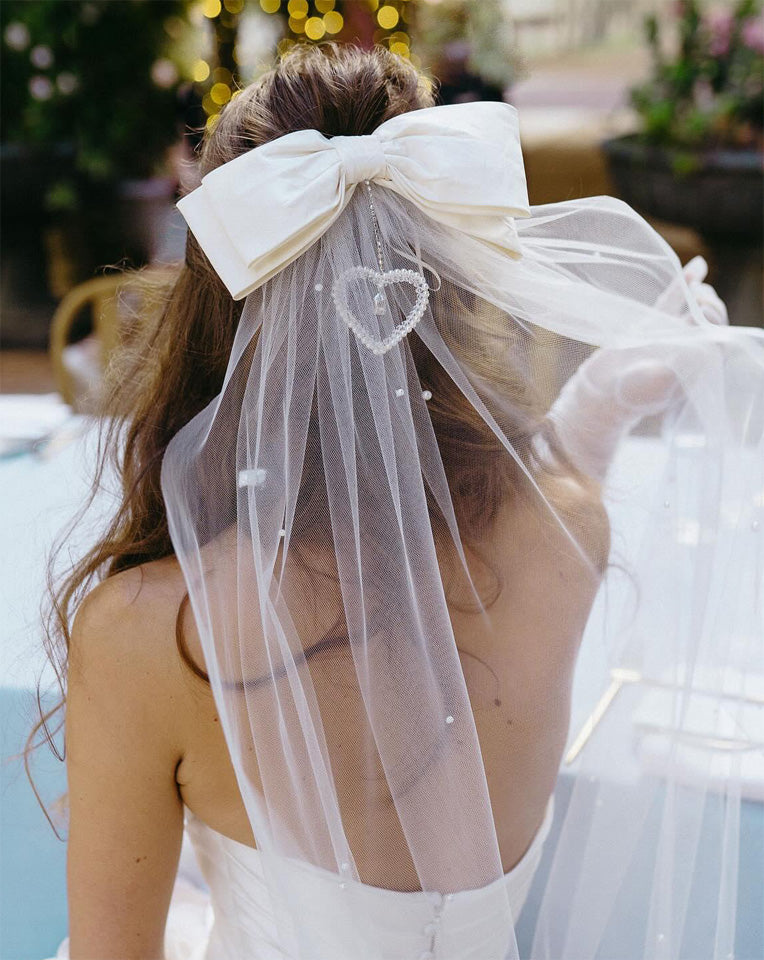 Elegant Bridal Silk Bow Headpiece with Crystal & Pearl Heart Charm - Perfect for Weddings, Bridal Showers & Formal Events | Kezani