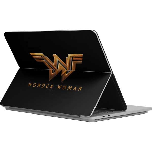 Skinit Officially Licensed Warner Bros Wonder Woman Gold Logo Laptop Skin Decal for Microsoft Surface Laptop Studio - Protective Vinyl Sticker for School, Office & Travel