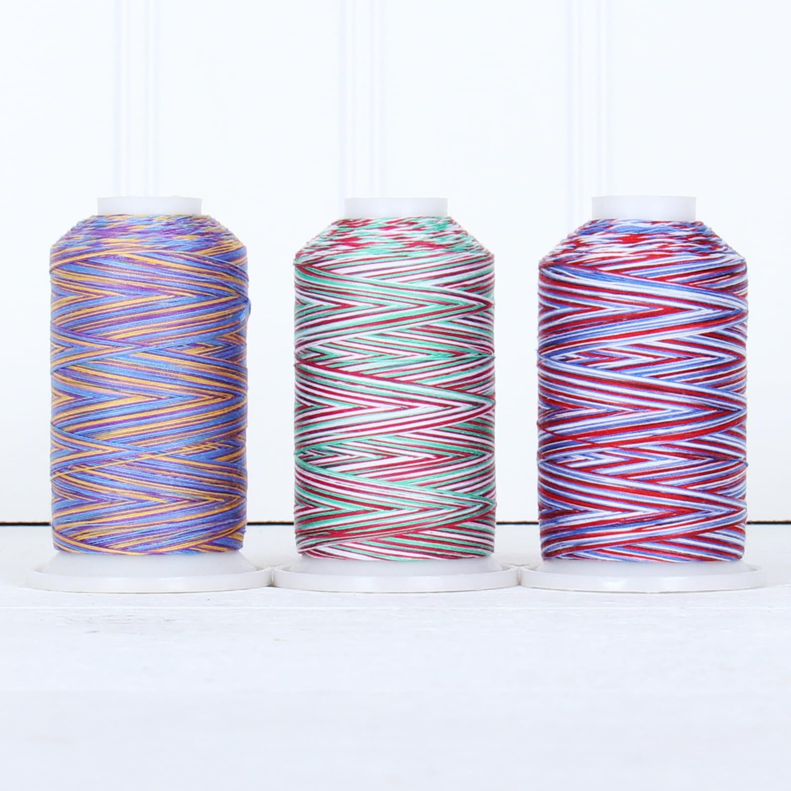 Threadart 100% Cotton Variegated Thread Set - 3 Cones Holiday Colors (600M/660 Yards) | 40/3 Weight Long Staple Low Lint Cotton Thread | Perfect for Quilting, Sewing, Embroidery & Crafting Projects | Over 20 Color Sets Available