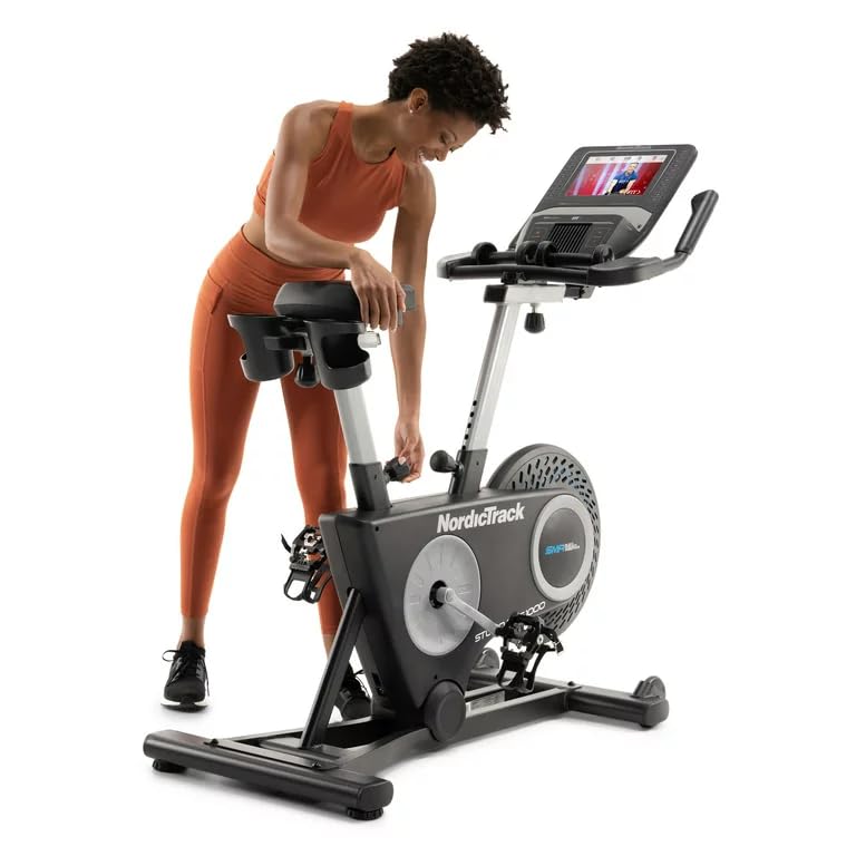 NordicTrack Studio Bike 1000 - Indoor Cycling Exercise Bike with 10” HD Touchscreen, 22 Digital Resistance Levels & Free 3 lb Dumbbells - Perfect for Home Workouts, Cardio Training & iFIT Interactive Fitness (Includes 30-Day Membership) - Black