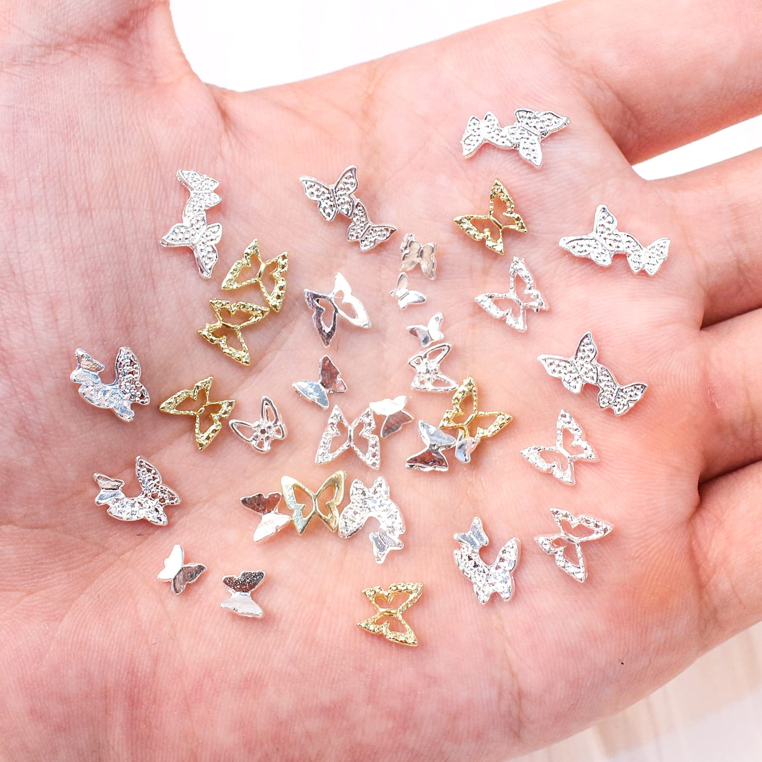 SILPECWEE 100pcs 3D Gold Silver Butterfly Nail Charms - Alloy Hollow Nail Studs & Nail Jewels for Nail Art Decoration | Perfect for Acrylic Nails, DIY Manicures & Professional Salon Use