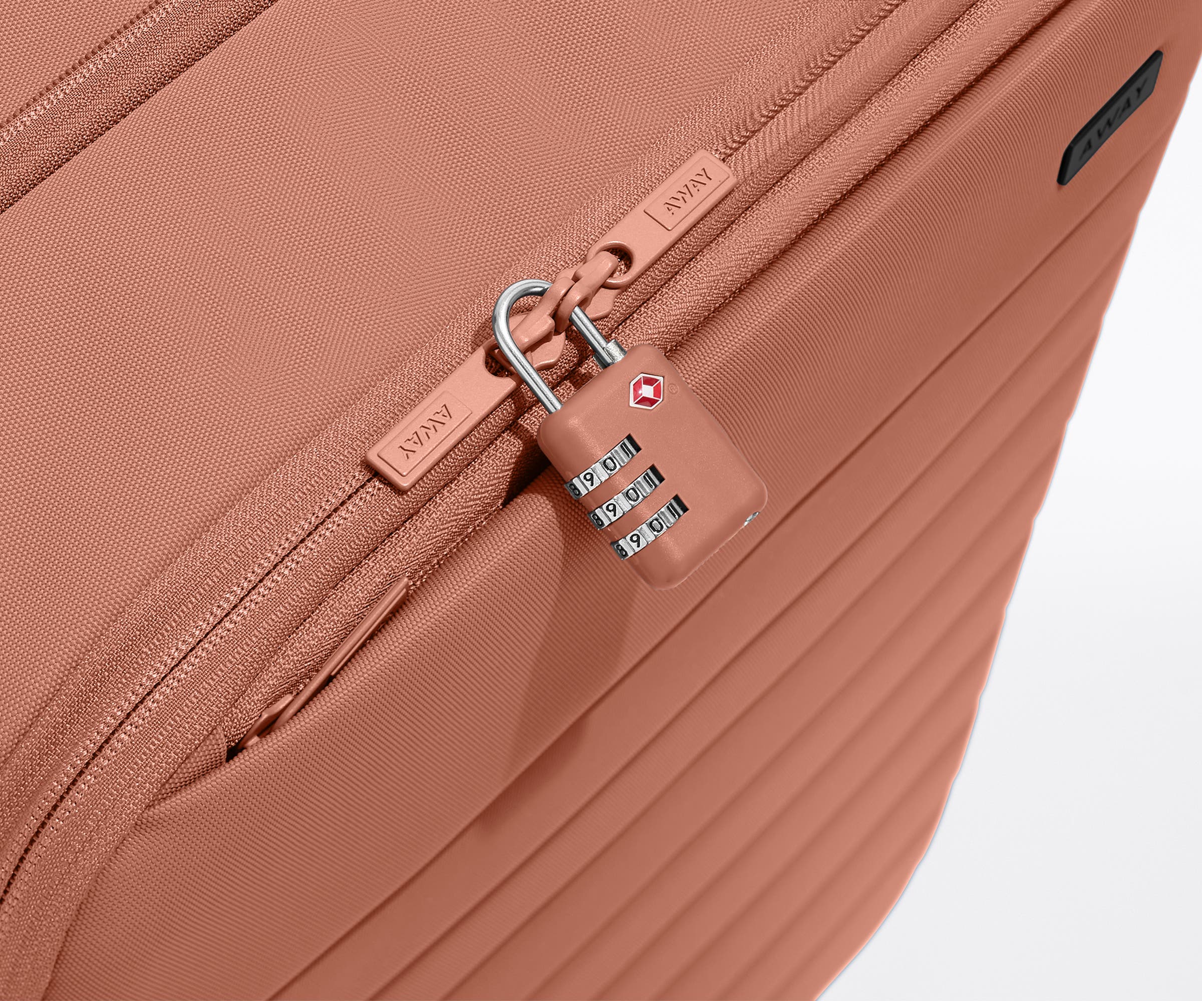 Softside Bigger Carry On Luggage in Clay Pink - Lightweight Spinner Suitcase for Women & Men, Perfect for Air Travel & Weekend Getaways