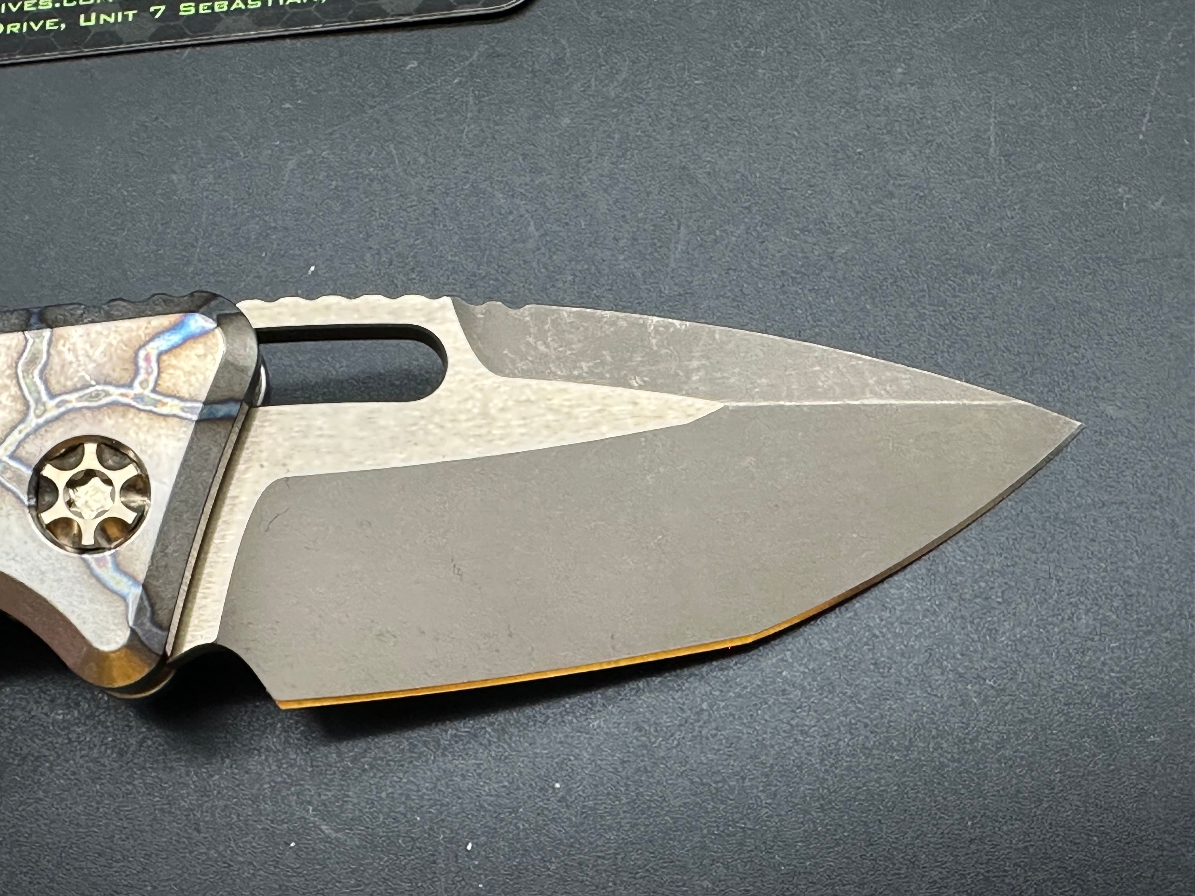 Heretic Medusa Battleworn Bronze Tanto Knife - Flamed Titanium Handle with 3 Bronze Accents | Tactical EDC, Outdoor Survival, and Collector's Item