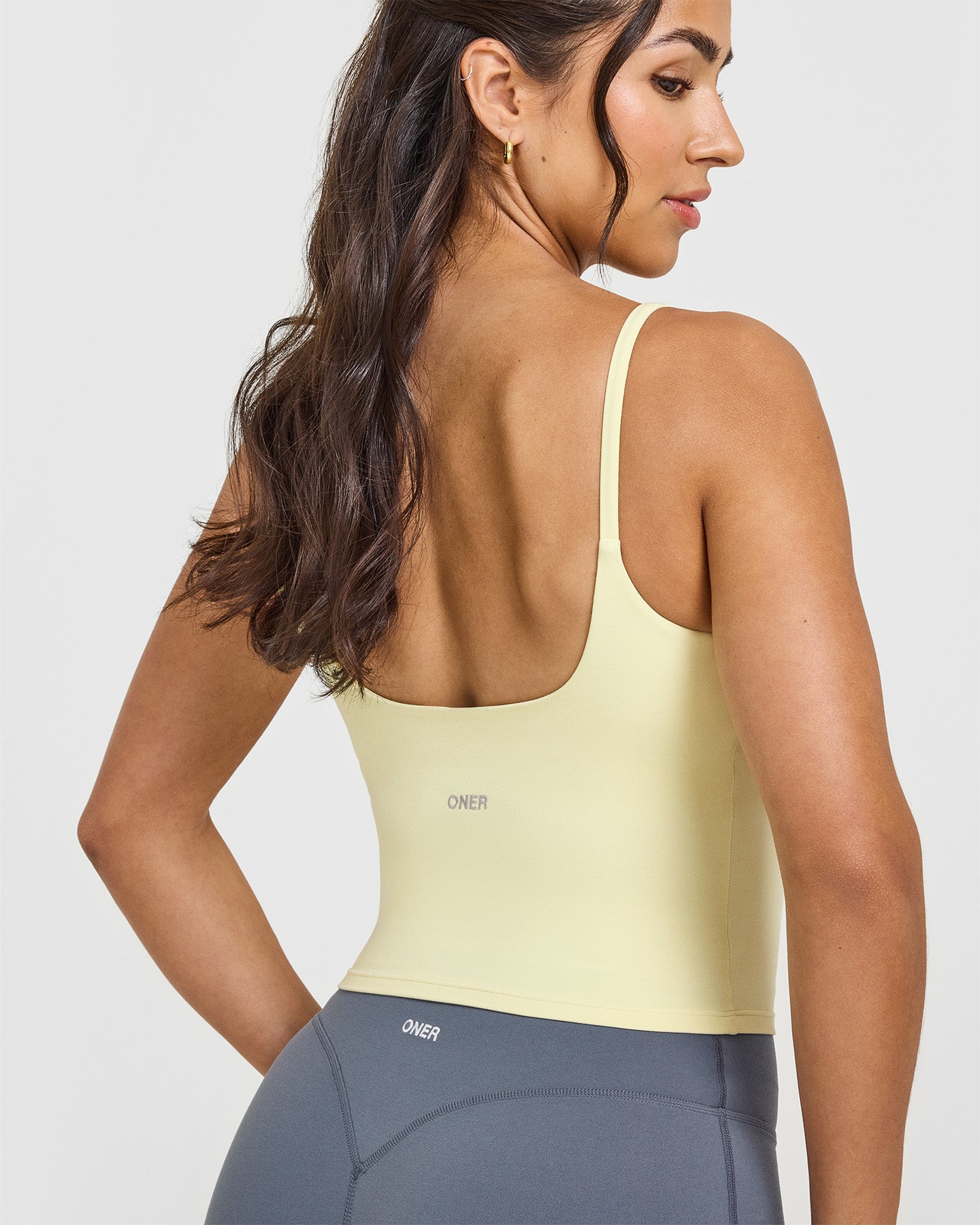 SoftMotion™ Strappy Mid Vest with Built-in Bra Shelf - Pastel Yellow | Comfortable Yoga Top for Women | Perfect for Workouts, Running & Lounge Wear
