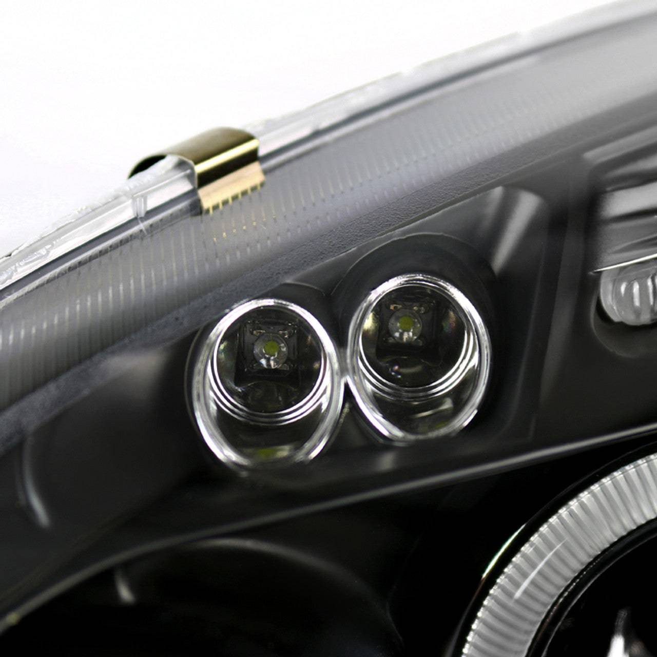 2006-2010 Volkswagen Jetta & 2006-2008 Golf/Rabbit Black Projector Headlight Housing Kit with Dual Halo LED - Upgrade Your Car Lighting for Night Driving & Enhanced Style