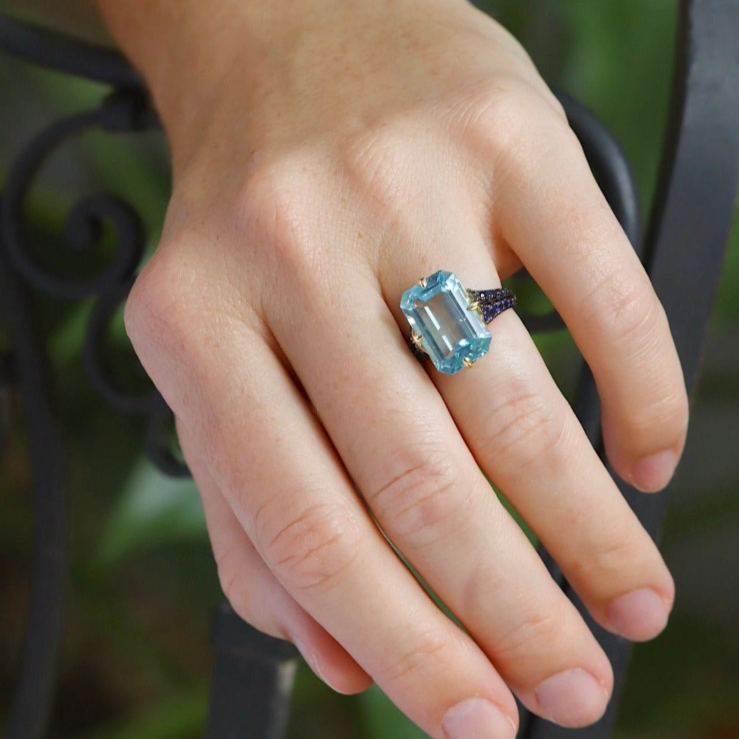 Goshwara 18K Gold Emerald Cut Blue Topaz & Sapphire Ring for Women - Elegant Jewelry Gift for Engagement, Anniversary & Special Occasions