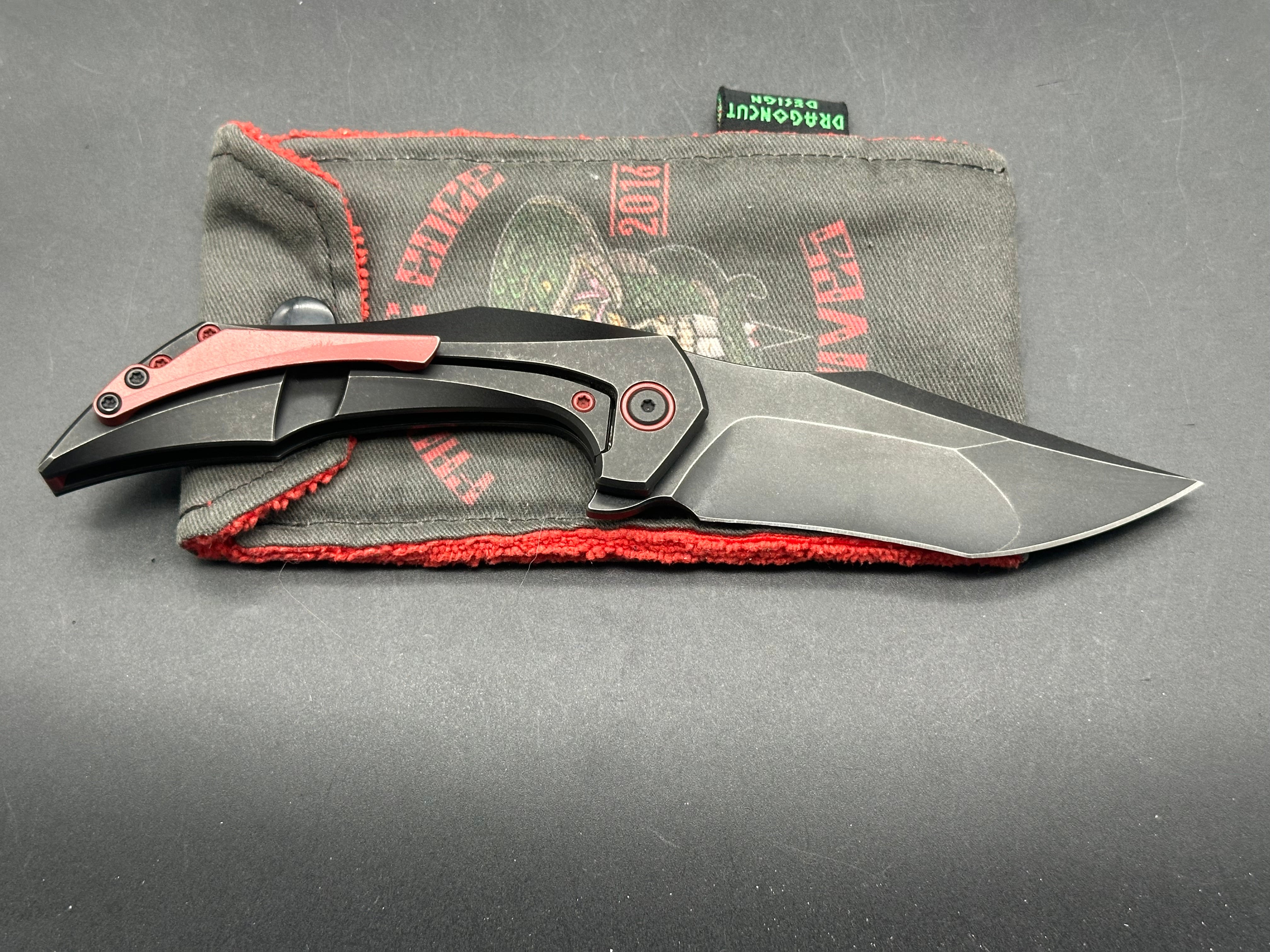 Fanatic Edge Omen Black Milled Titanium Handle Knife with Red Hardware & Clip Point Tanto Blade - Bohler M390 Steel - EDC, Camping, Survival, Outdoor Activities