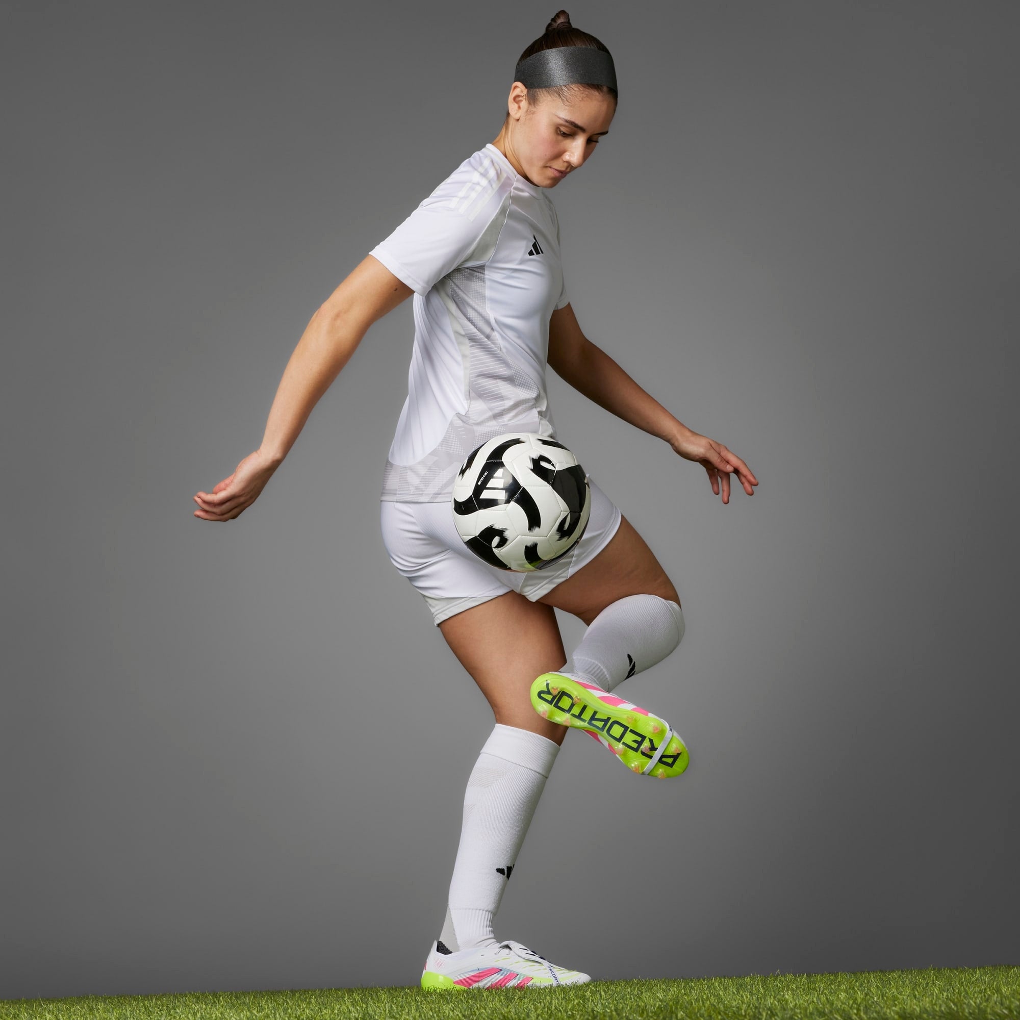 **adidas Predator Elite Fold Over Tongue Soccer Cleats - Lightweight & Comfortable for Football Training & Matches**    *(Use Case: Perfect for competitive soccer players seeking superior traction and support on firm ground surfaces.)*