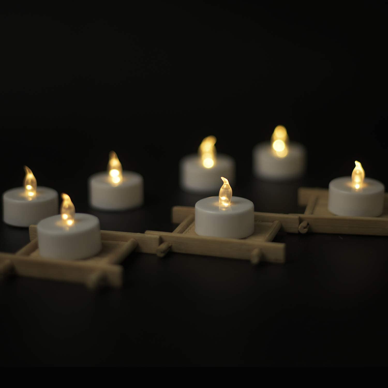 YIWER 12-Pack LED Tea Light Candles - 200 Hours Battery Operated Flameless Candles in Warm White for Weddings, Parties, Home Decor & Romantic Ambiance
