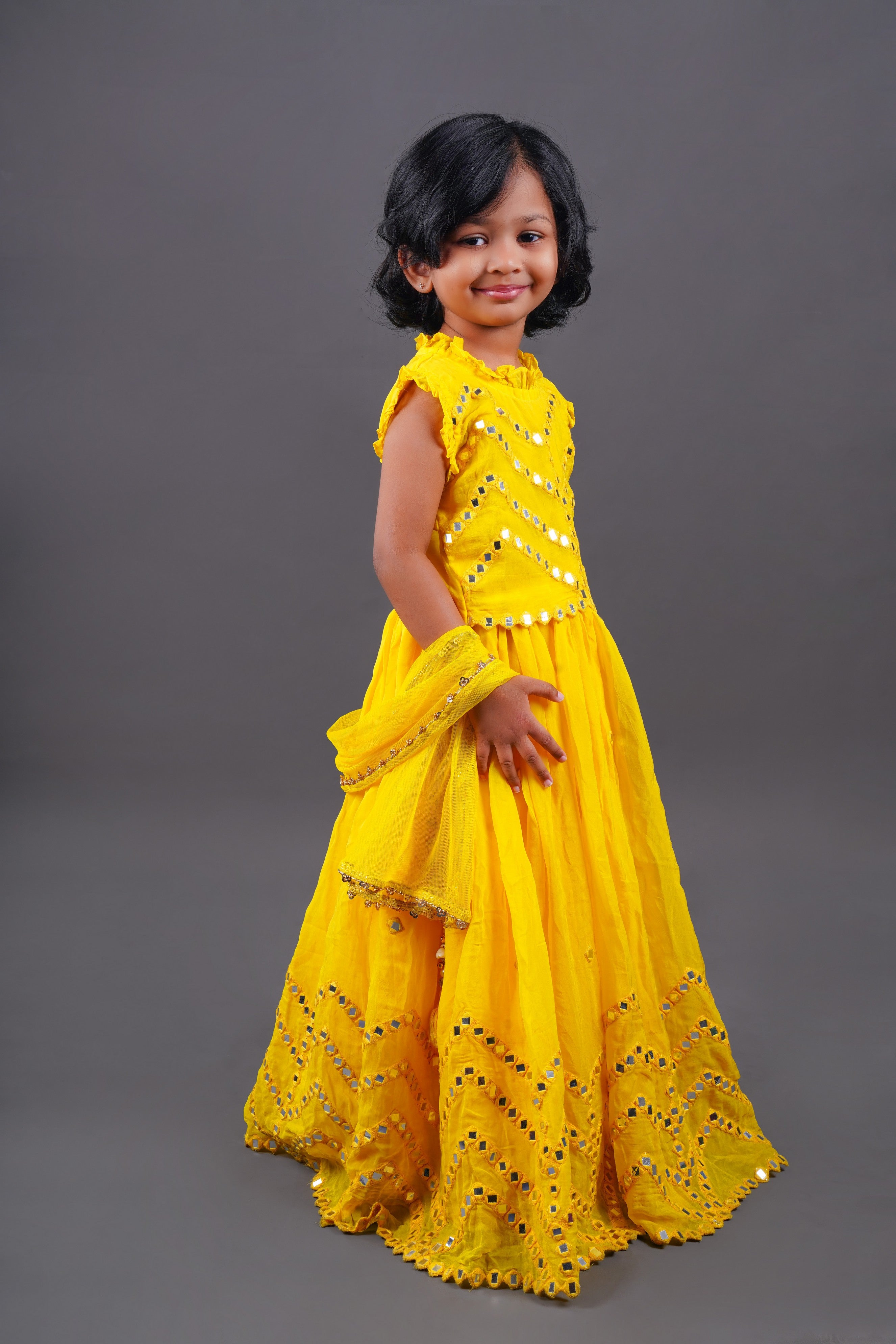 Pre Order: Yellow Faux Mirror Work Zig Zag Design Top and Lehenga Set - Perfect for Festivals, Weddings, and Ethnic Parties