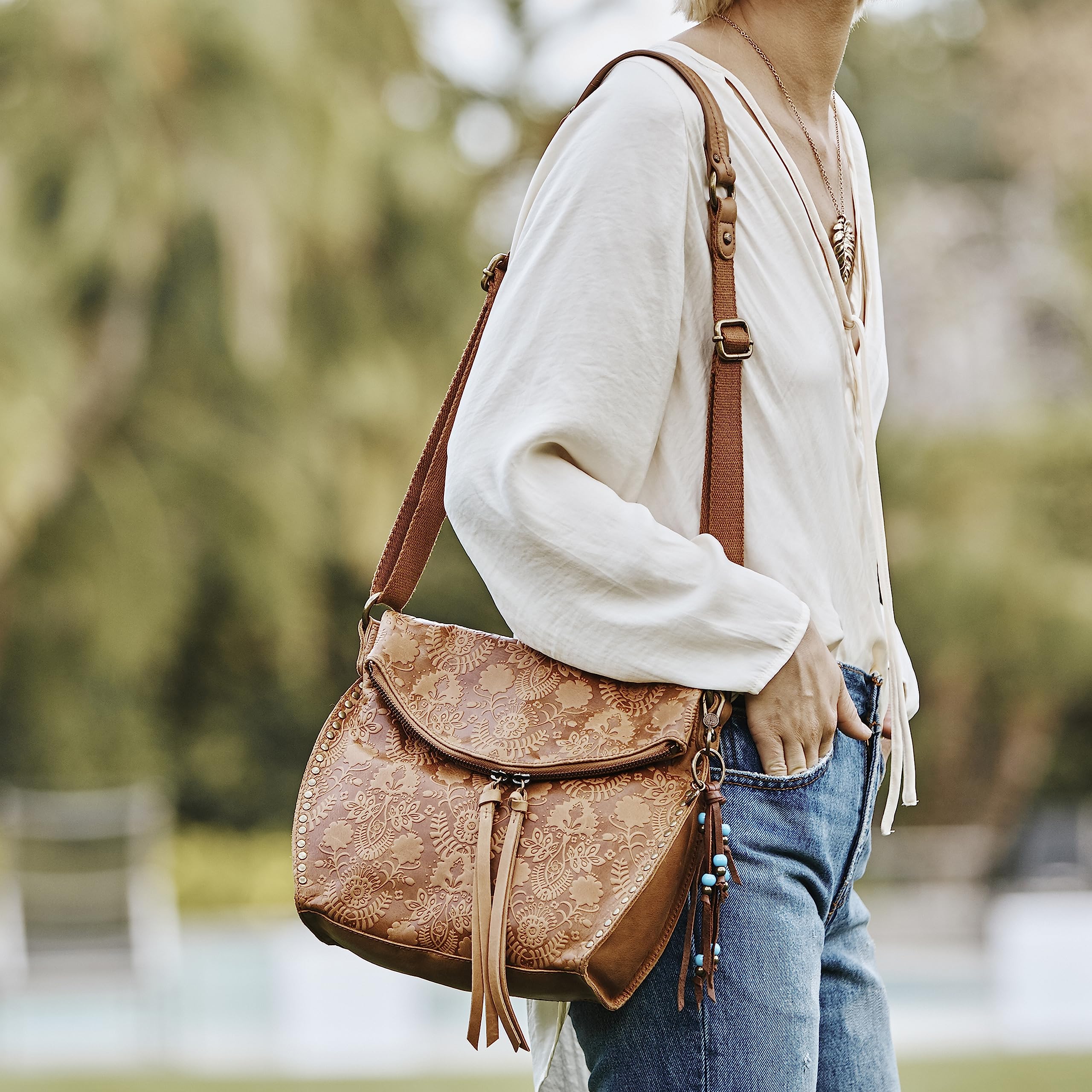 The Sak Women's Silverlake Leather Crossbody Bag - Adjustable Strap, Zipper Pockets, Tobacco Floral Embossed - Perfect for Casual Outings, Travel & Everyday Use