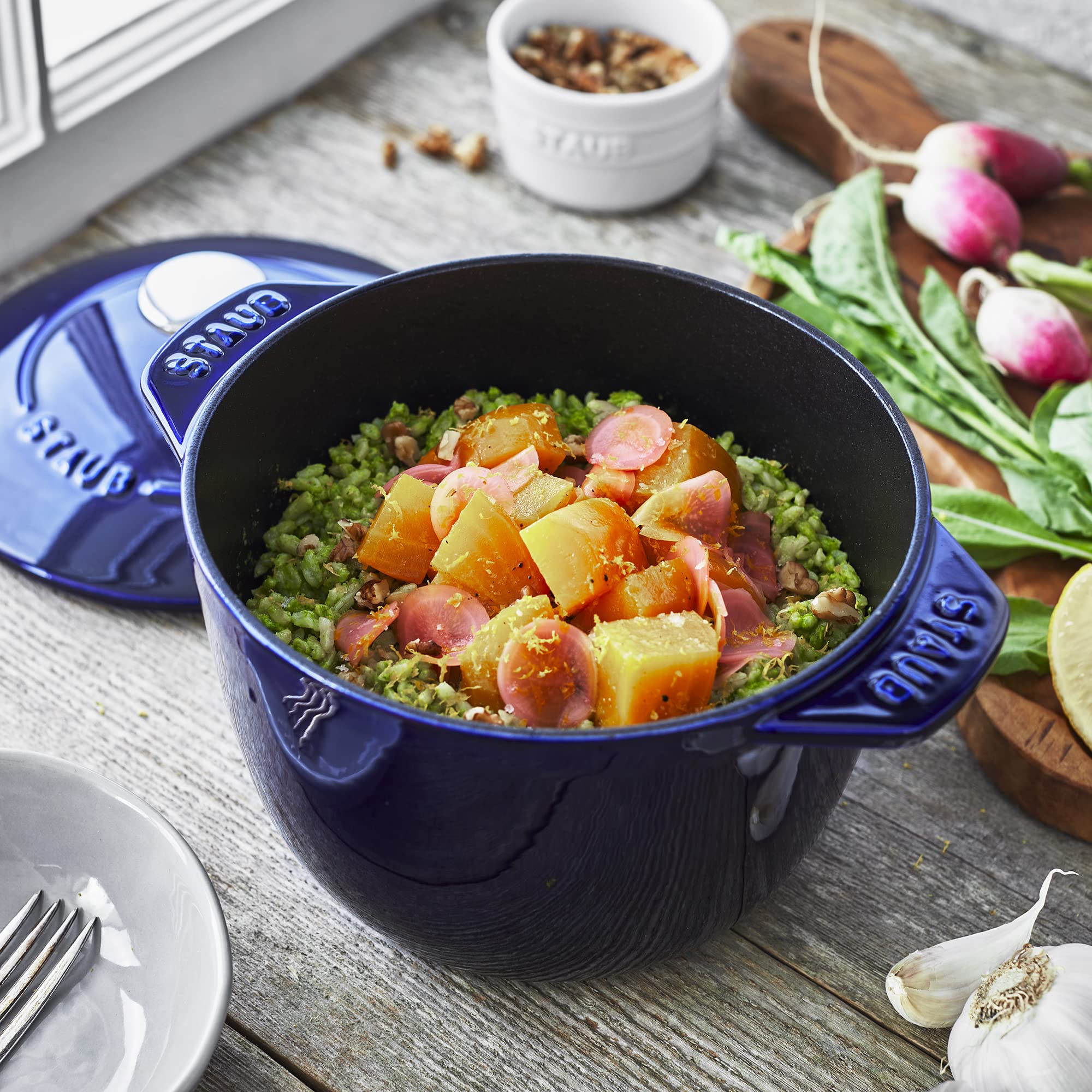 Premium Staub Cast Iron 1.5-Quart Petite French Oven - Authentic Dark Blue Enameled Dutch Oven, Made in France | Perfect for Soups, Stews, Baking & Slow Cooking