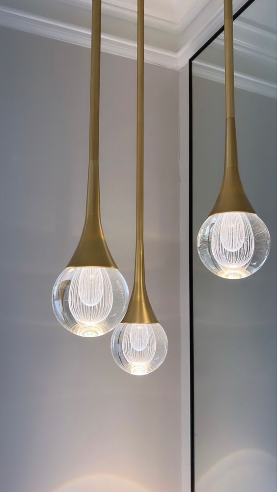 Elegant Drop-Shaped Crystal Pendant Light - Modern Chandelier for Dining Room, Bedroom, or Living Room Decor