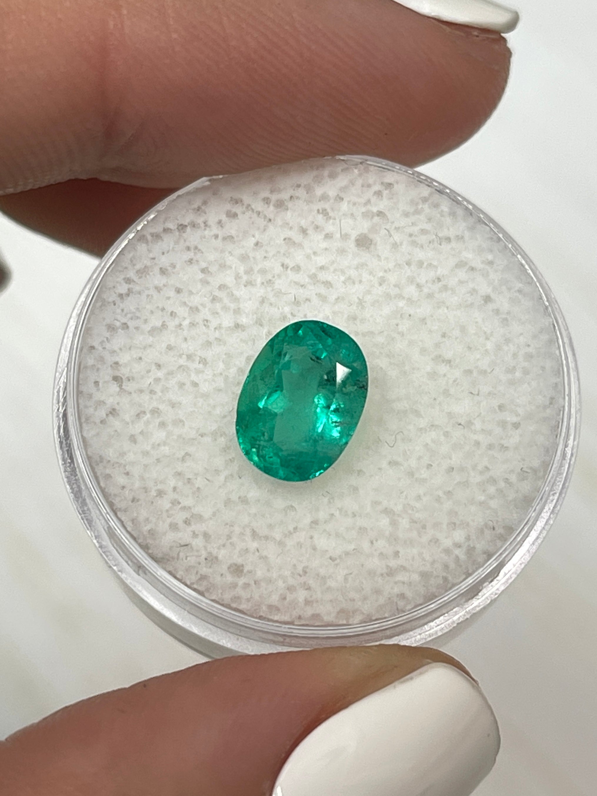 1.74 Carat 9x7mm Natural Colombian Emerald Oval Cut Loose Gemstone - Bluish Green with Freckles for Jewelry Making & Engagement Rings