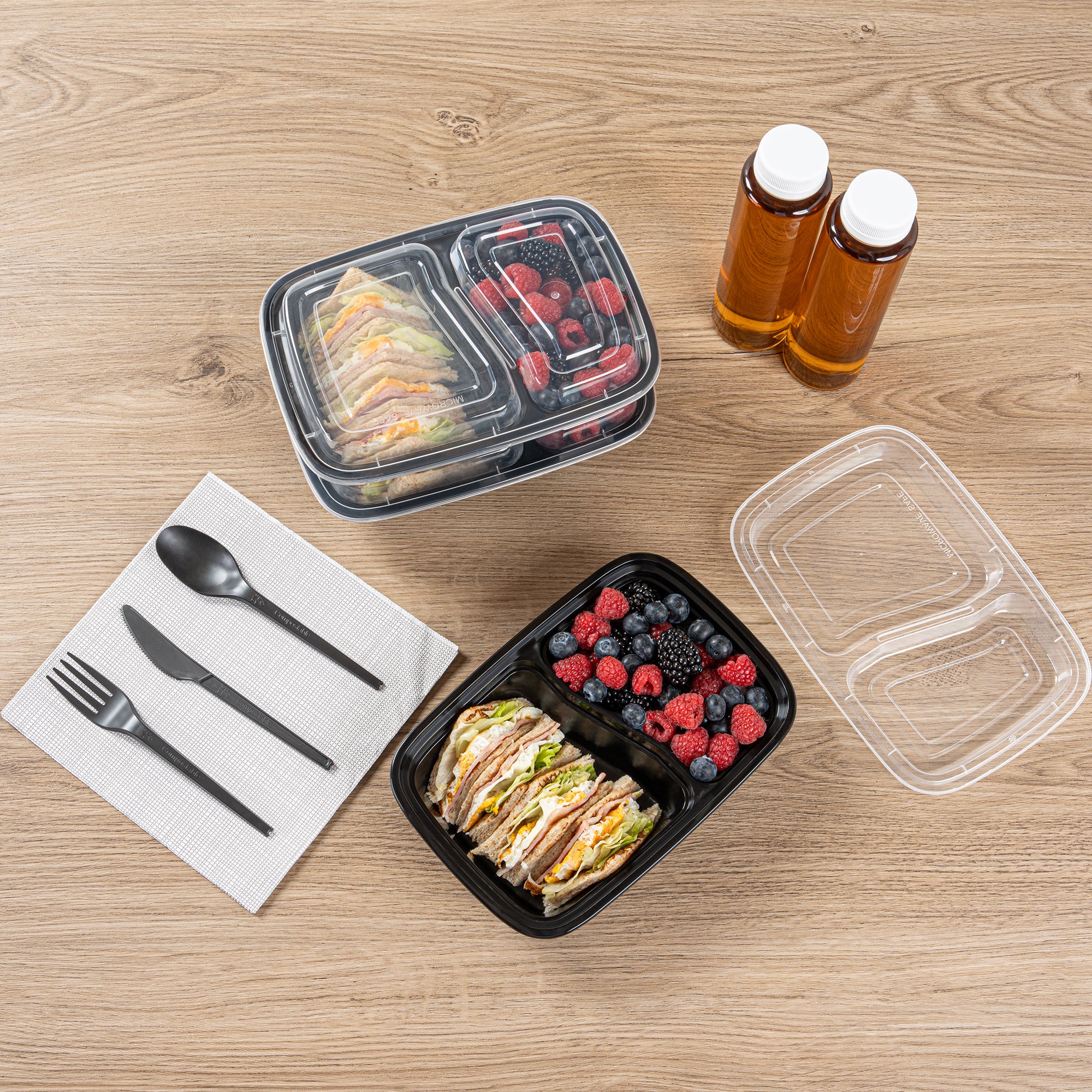 32 oz Black Plastic 2 Compartment Food Storage Containers with Clear Lids - Microwave Safe, 8.75