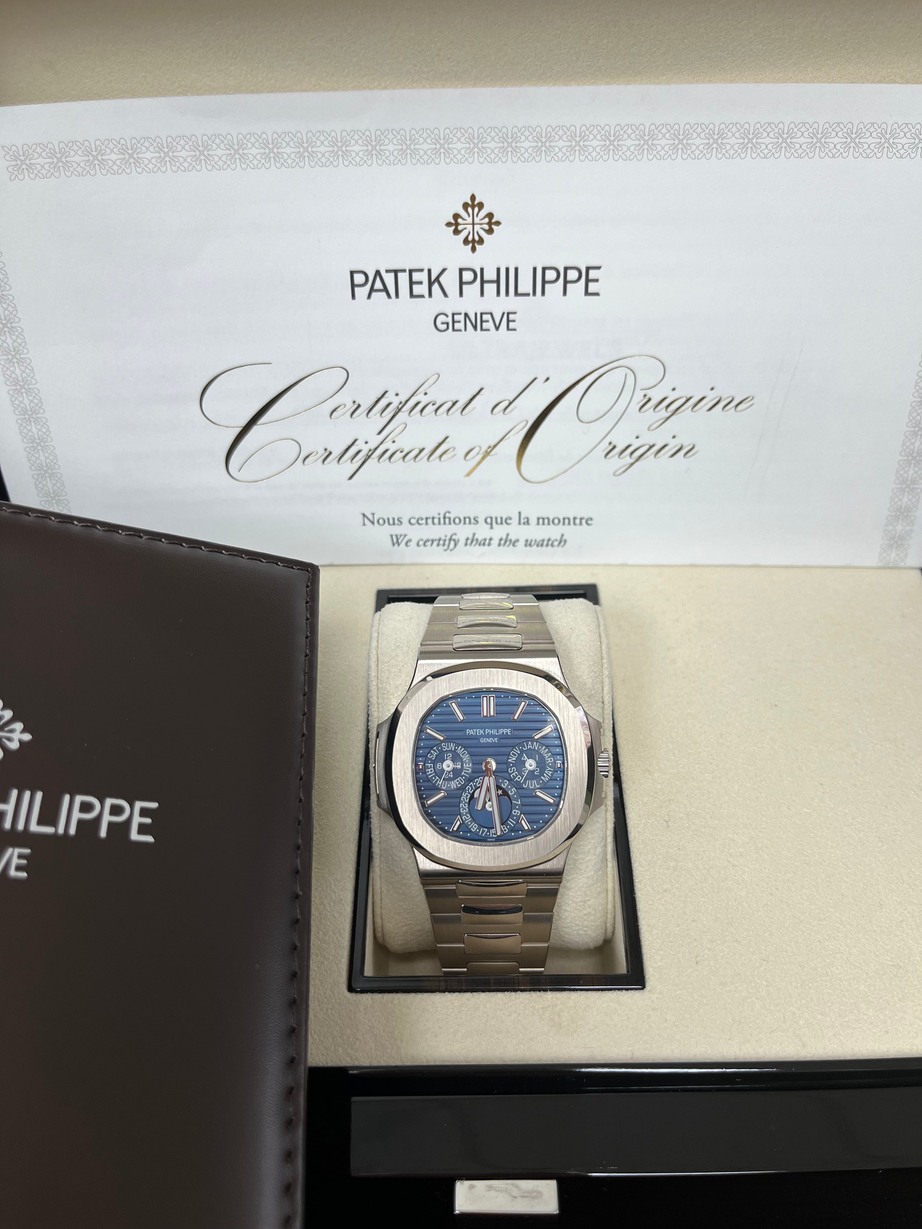 Patek Philippe Nautilus Perpetual Calendar Watch - 18K White Gold Case, Blue Sunburst Dial (Ref#5740/1G-001) | Luxury Swiss Timepiece for Men, Business Meetings & Special Occasions