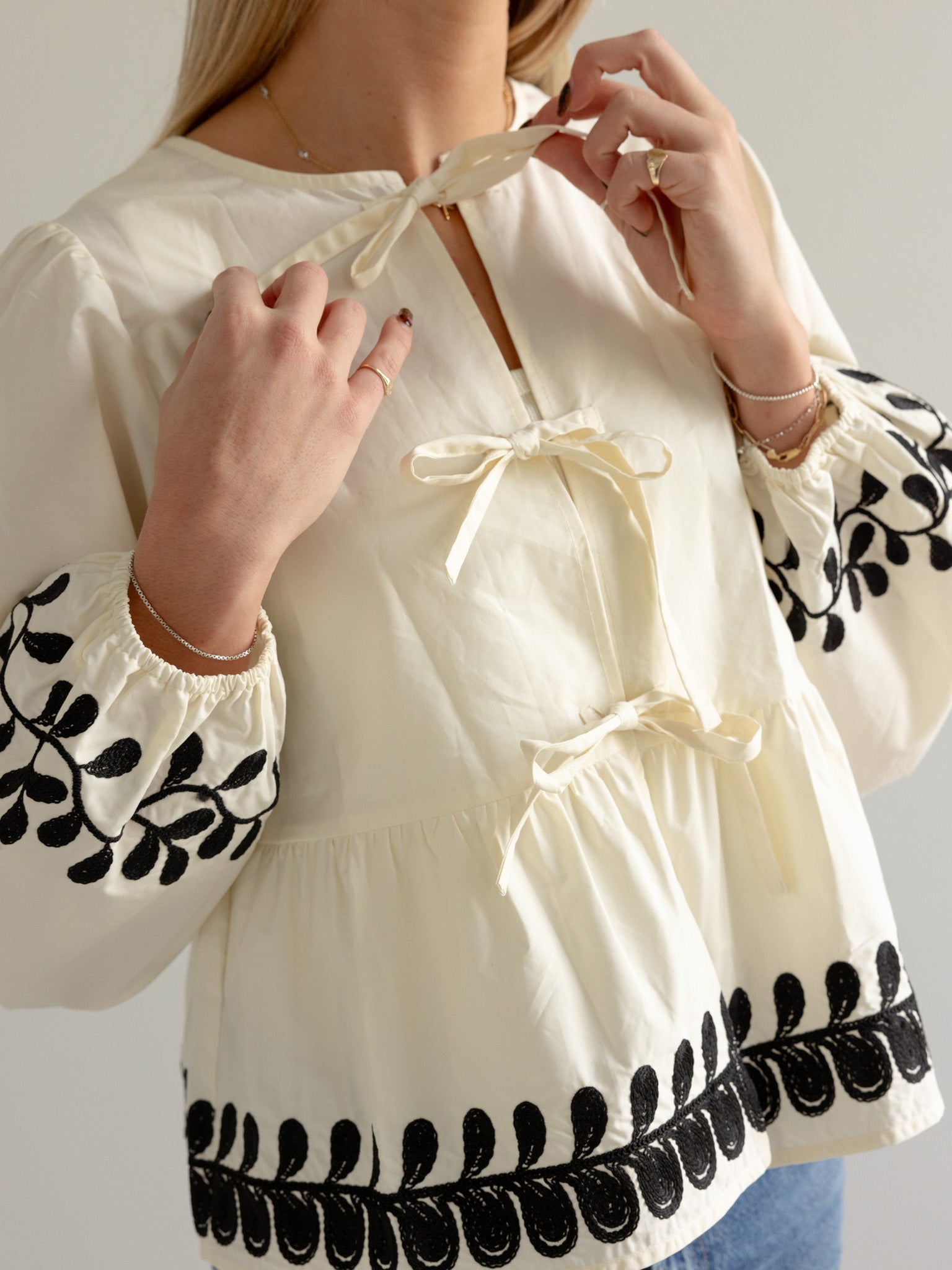 Elegant Embroidered Peplum Bow Blouse for Women - Flowy Floral Top for Office, Party & Date Night