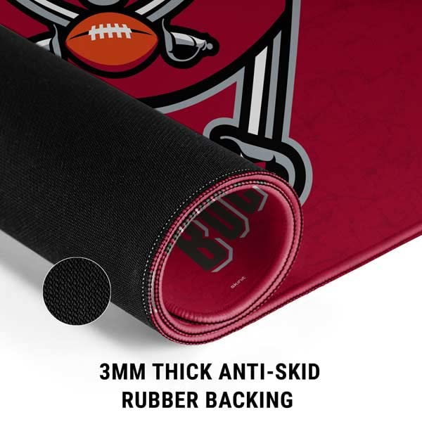 Skinit Medium Gaming Mouse Pad - Officially Licensed NFL Tampa Bay Buccaneers Distressed Design | Non-Slip Rubber Base, Waterproof, Stitched Edges | Perfect for PC, Laptop, Office & Gaming Setup