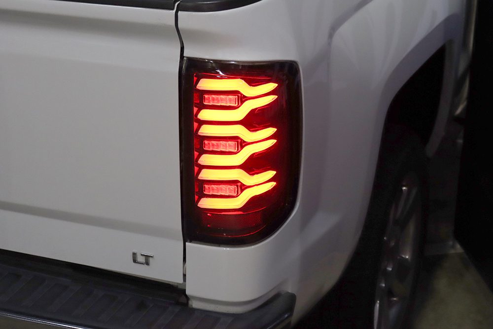 14-18 Chevrolet Silverado 1500 / 15-19 Silverado 2500HD 3500HD / 15-19 GMC Sierra 3500HD Dually LUXX Series Black LED Tail Lights - Upgrade for Enhanced Visibility & Style on Trucks