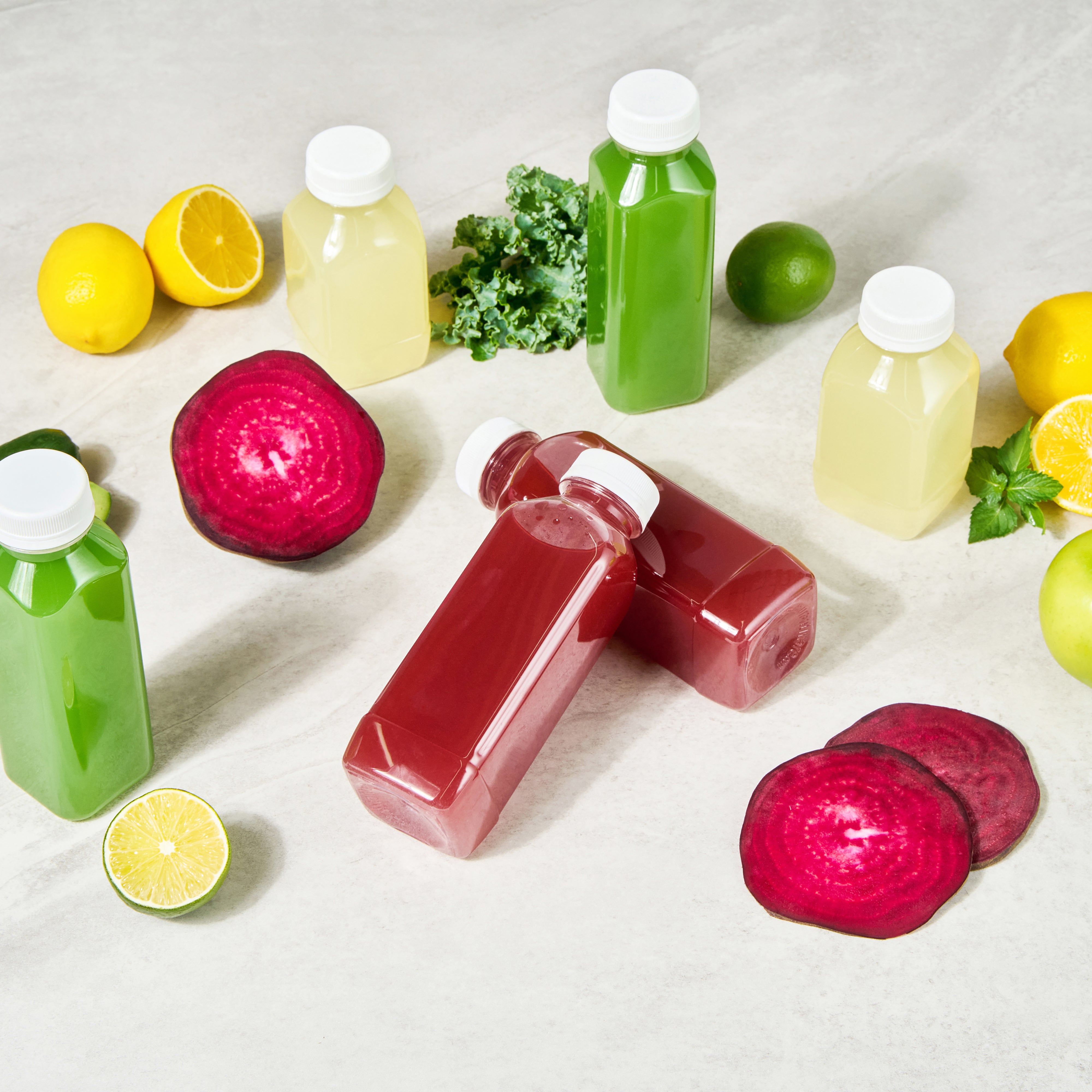 16 oz Square Clear Plastic Cold Pressed Juice Bottles with Safety Cap - 2.25