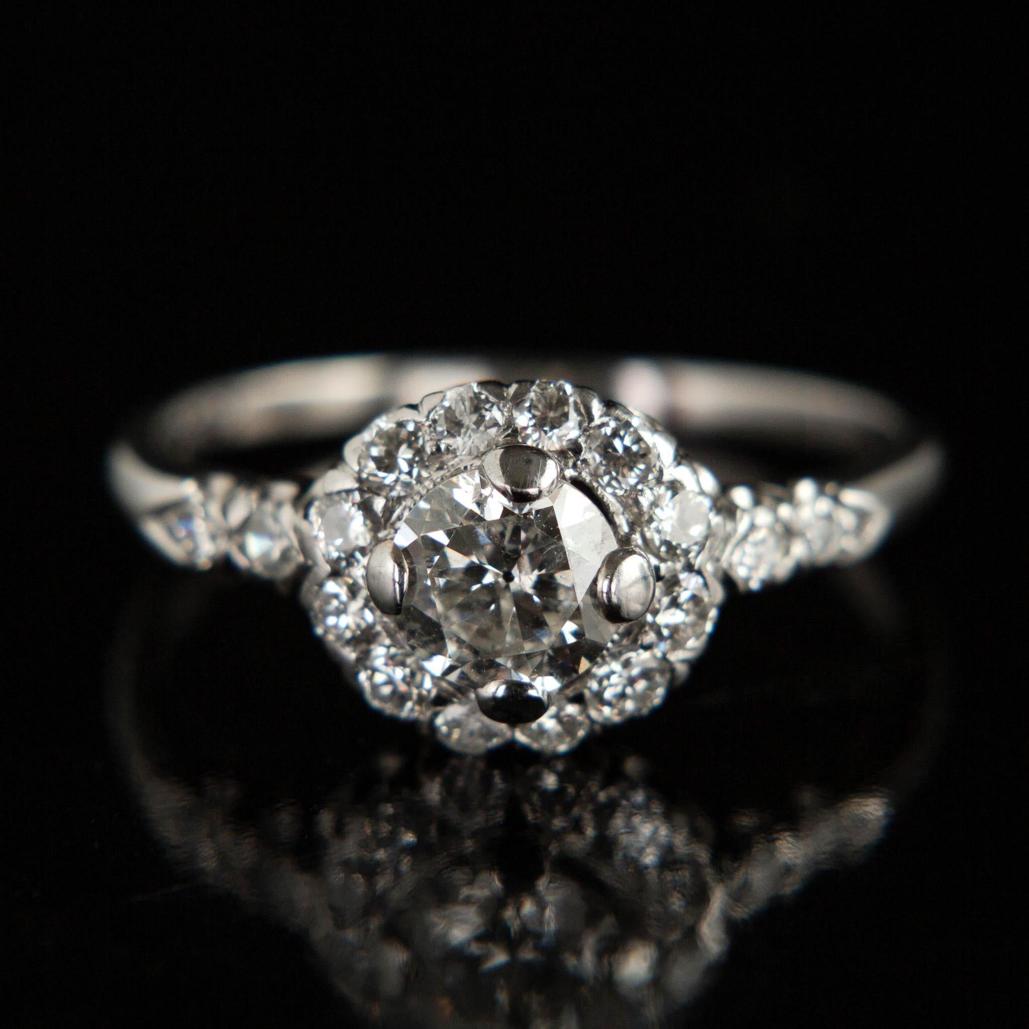 Vintage Platinum Diamond Halo Engagement Ring - Circa 1940 Antique Jewelry for Weddings & Special Occasions