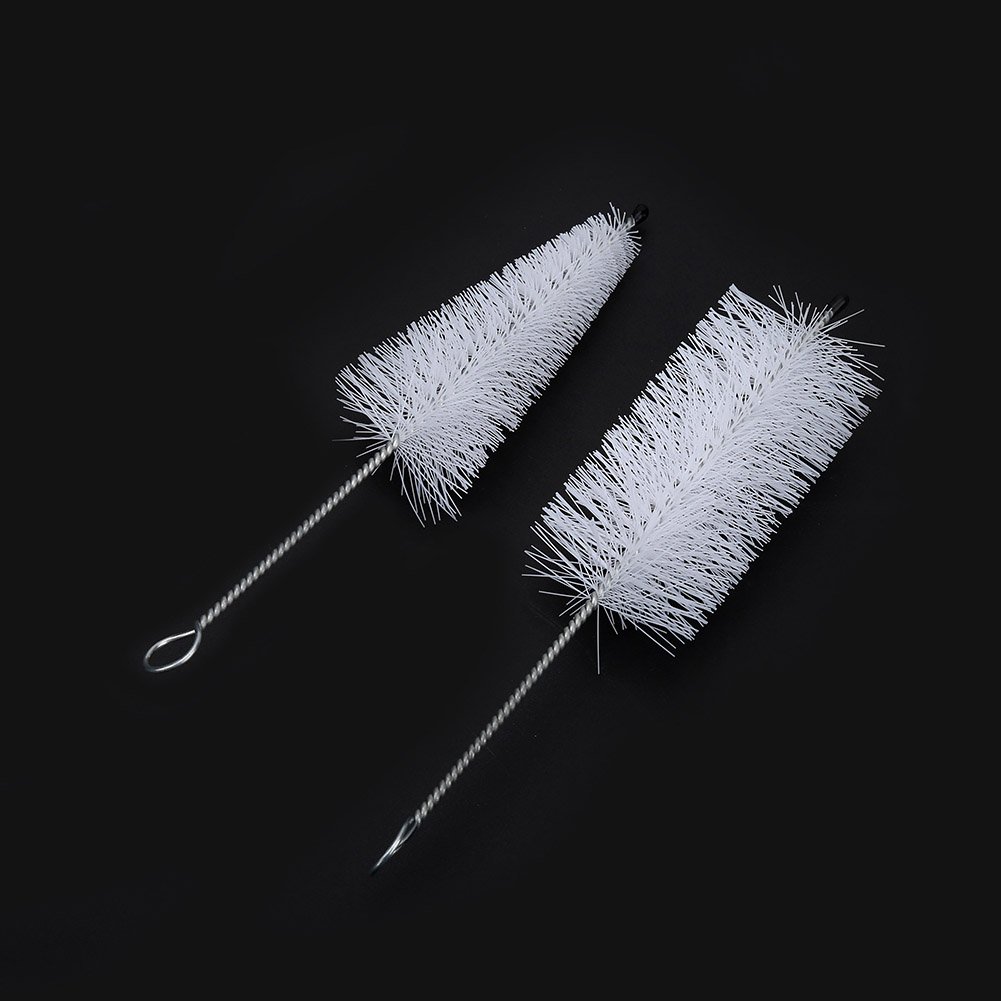 **4-Piece Trumpet Cleaning Kit - Mouthpiece Brush, Valve Brush, Flexible Brush & Cleaning Cloth for Professional Trumpet Maintenance & Care**    *(Perfect for Musicians, Band Students & Trumpet Players - Keep Your Instrument Clean & Shiny!)*
