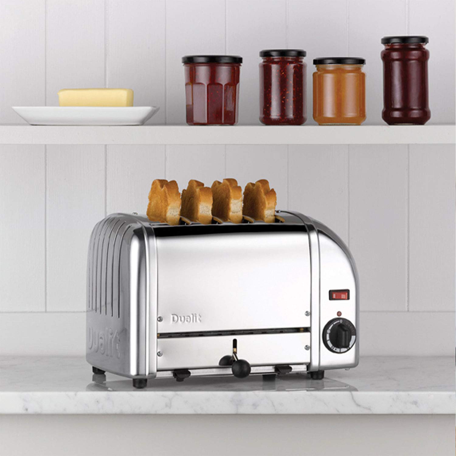Dualit Classic 4 Slice Vario Toaster - Stainless Steel, Handcrafted in UK - ProHeat® Replaceable Elements - 2/4 Slice Heating, Defrost Function, Mechanical Timer - Durable & Easy to Maintain - Perfect for Breakfast, Brunch & Family Dining