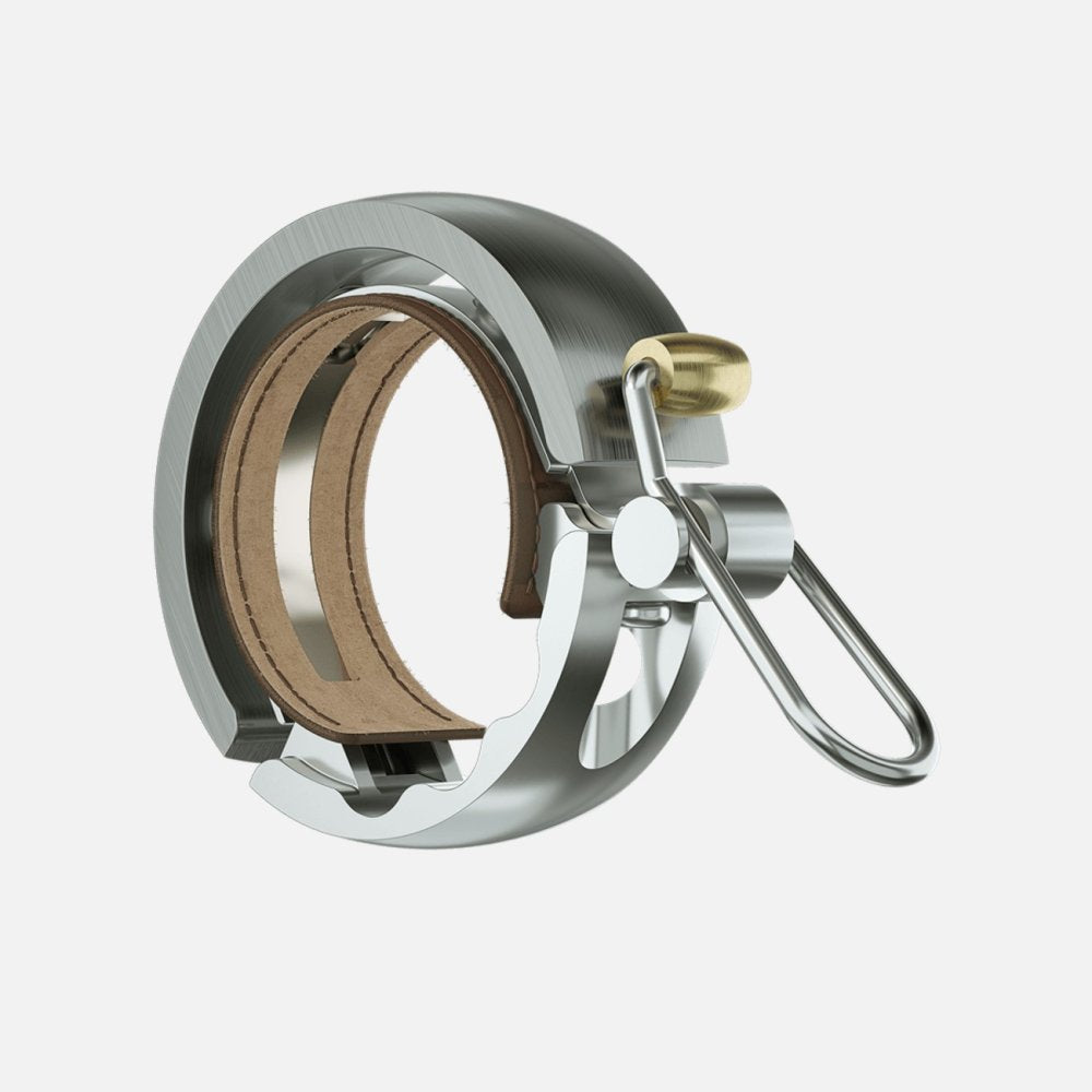Knog Oi Luxe Bike Bell - Premium Aluminum Bicycle Bell for Road & Mountain Bikes - Loud & Stylish Cycling Accessory for Urban Commuting & Outdoor Adventures