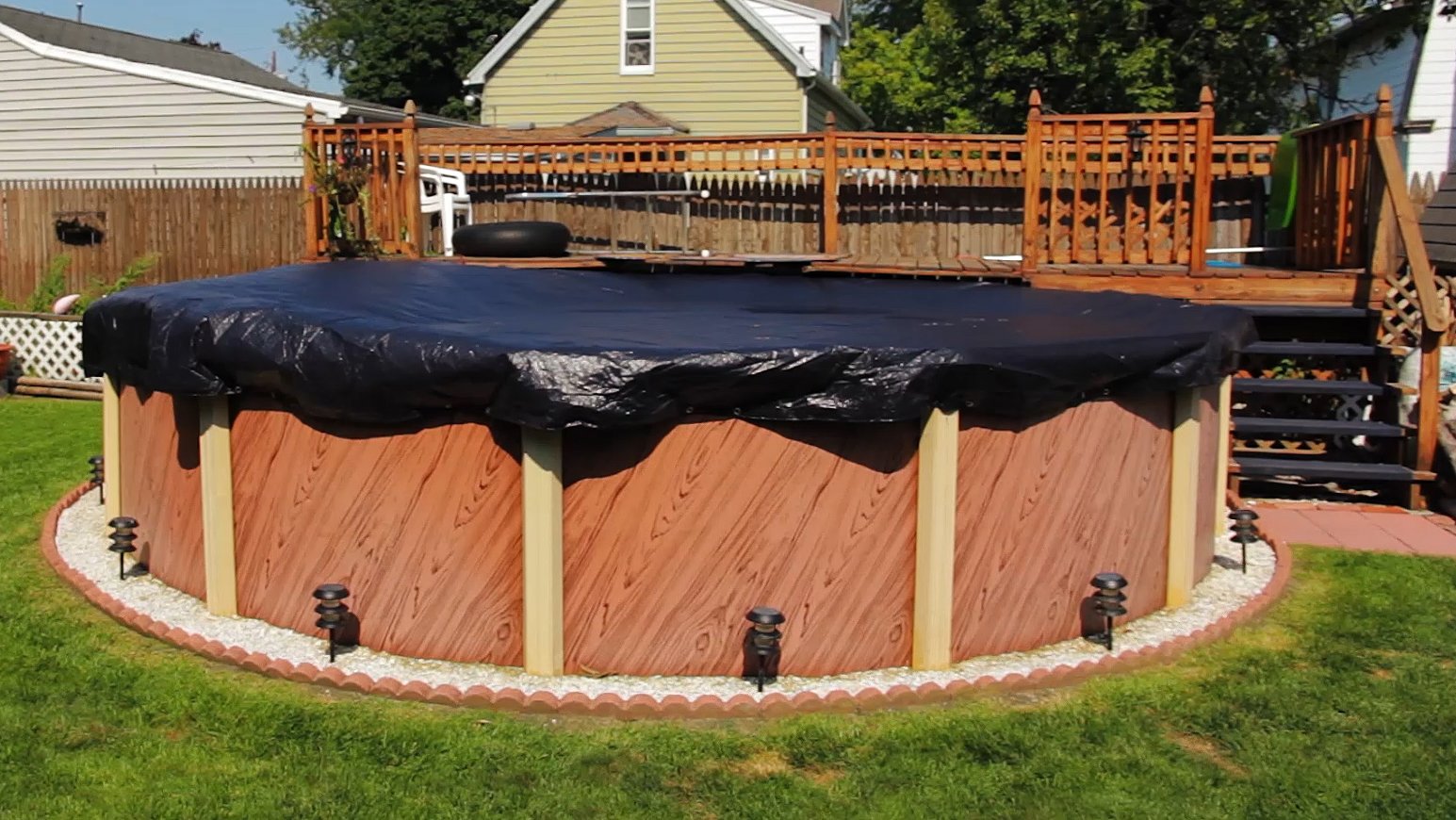 Buffalo Blizzard 33 ft Round Above Ground Pool Cover - Heavy Duty Winter Protection | Blue/Black Reversible Cold & UV Resistant | Shields from Debris & Harsh Weather | Perfect for Winterizing Inground & Above Ground Pools